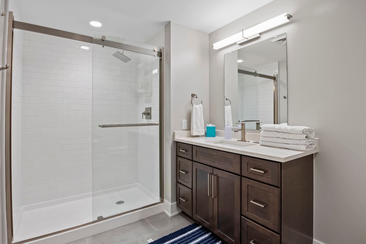 Vanity and shower in the second bathroom