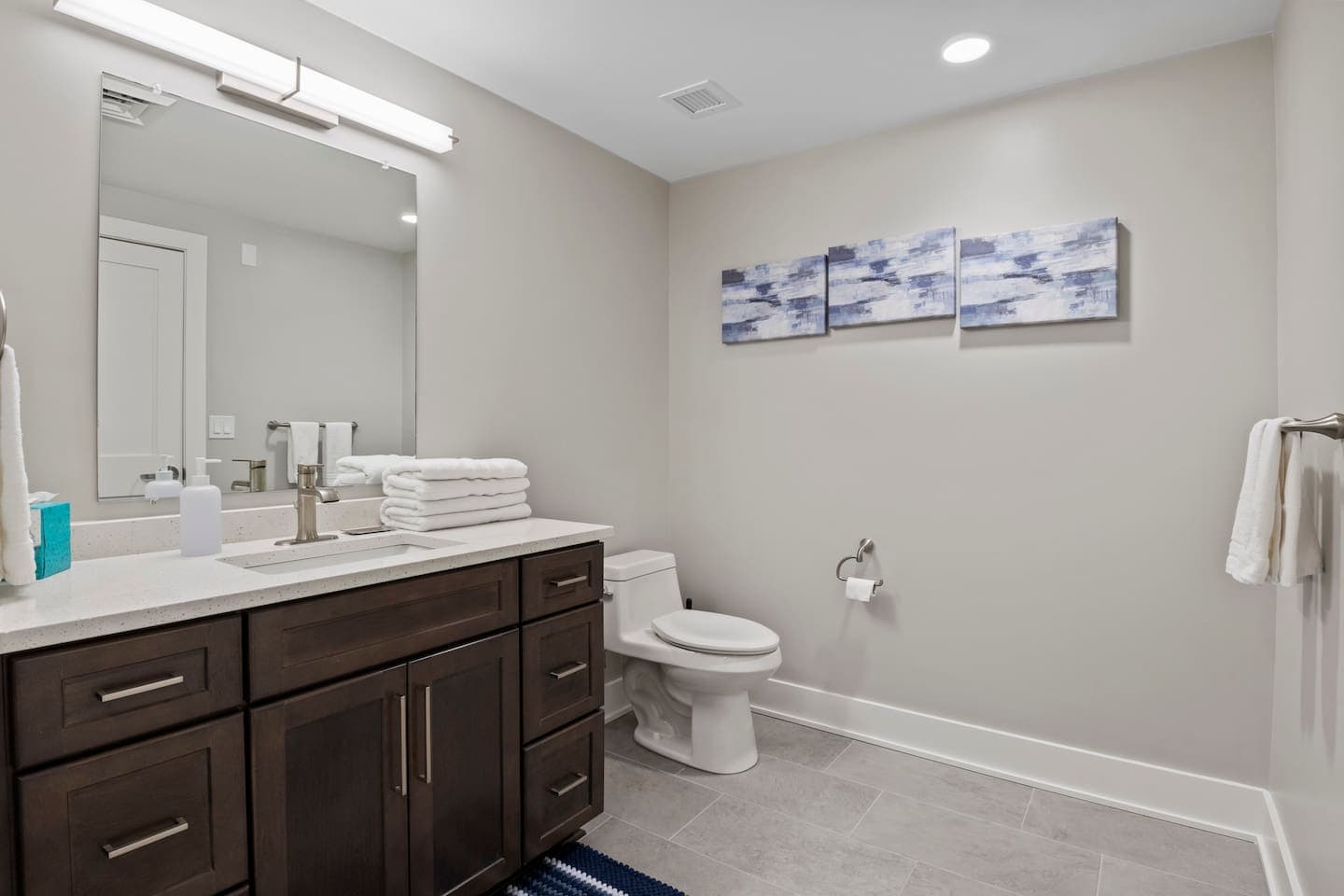 Full bathroom with vanity and toilet