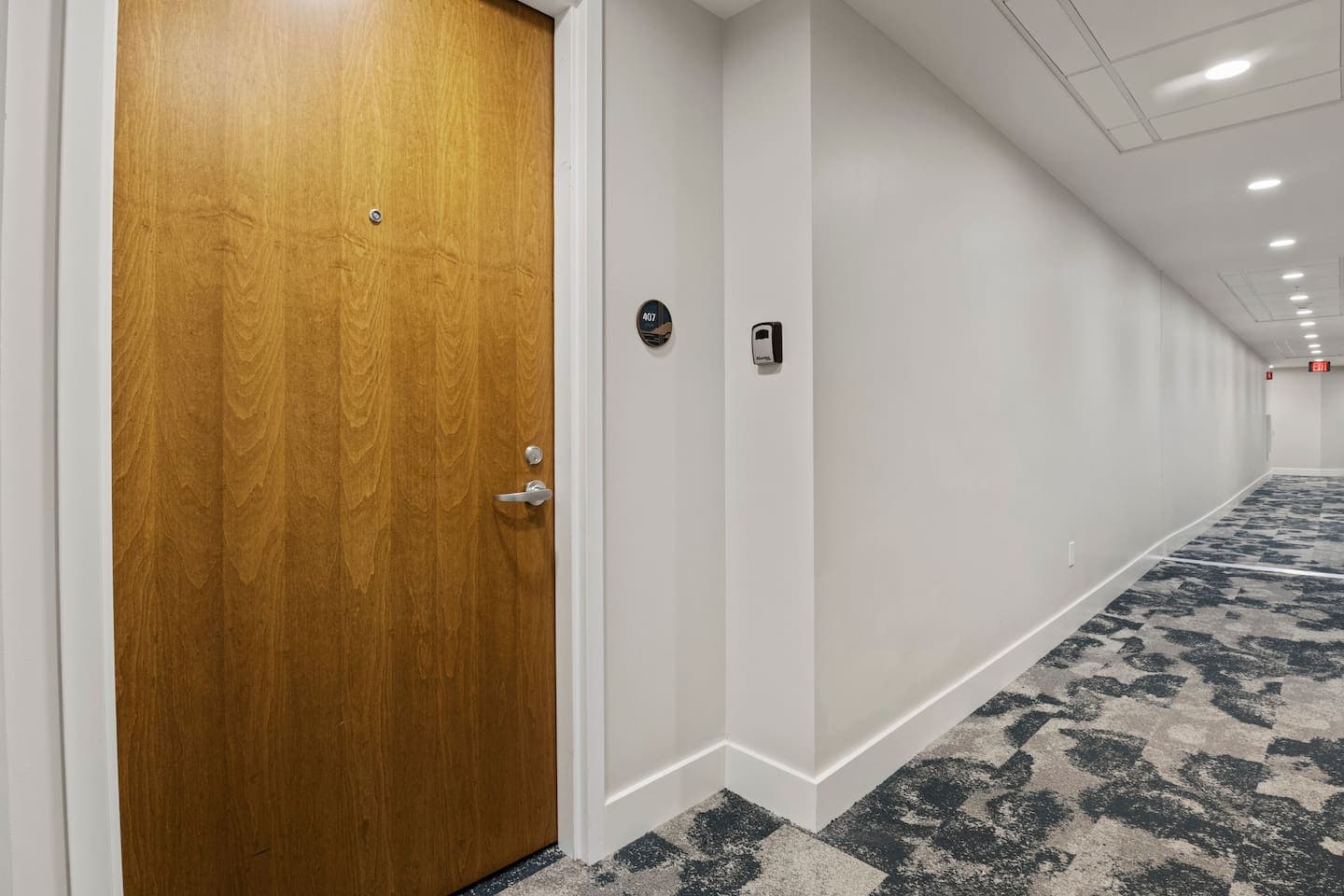 Interior hallway with wooden entry door