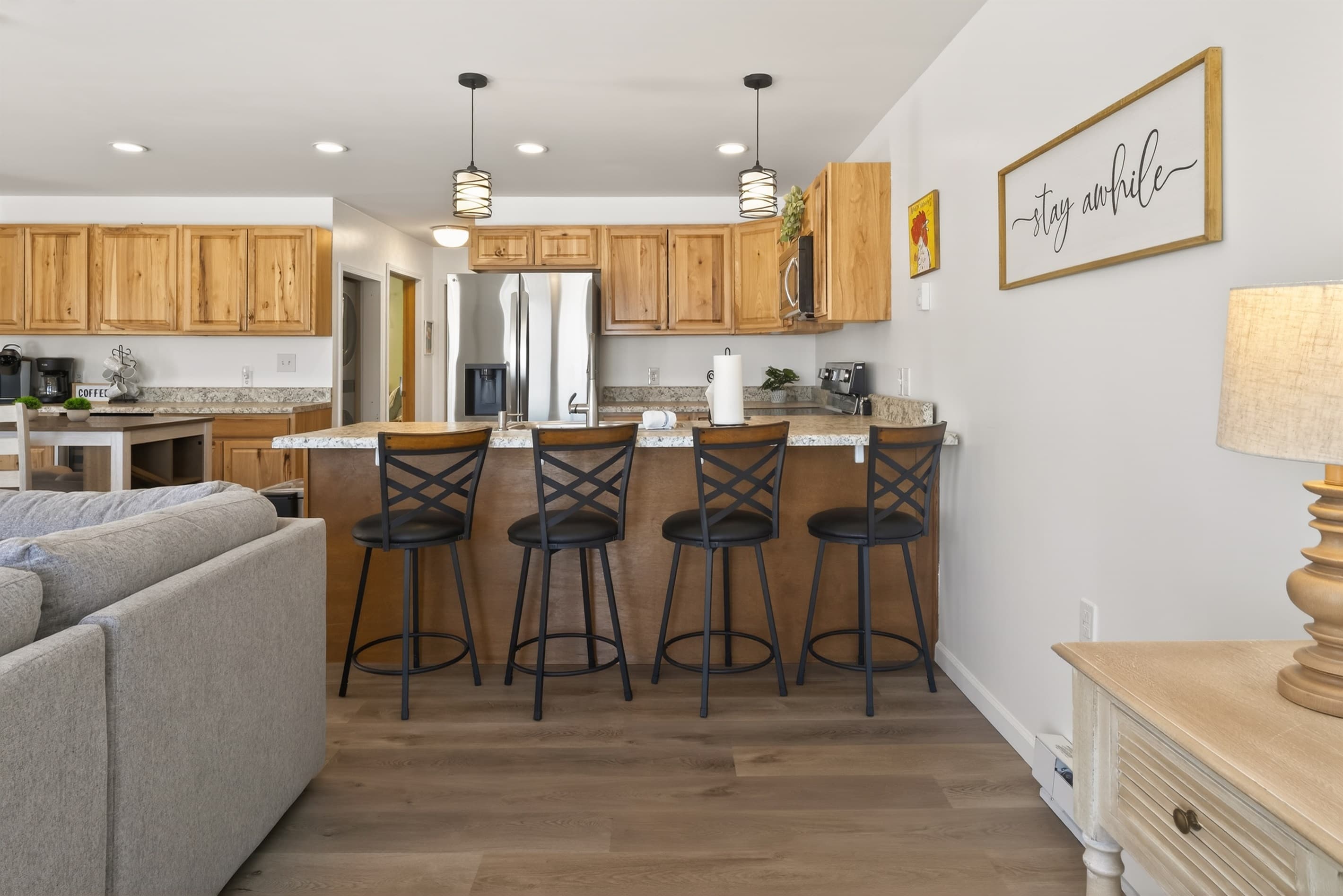 Breakfast bar with four high-back stools