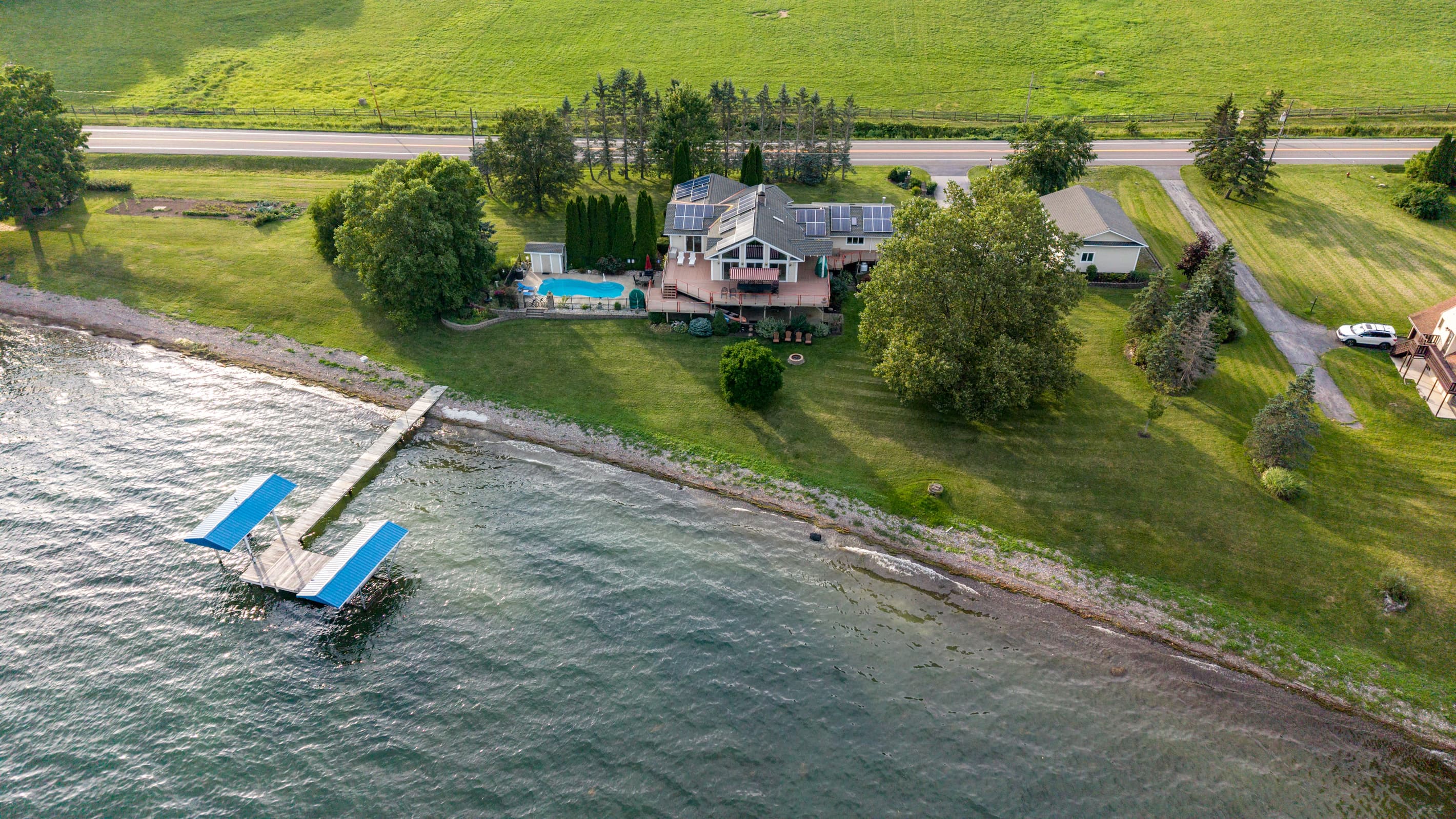Aerial view of the house and shoreline