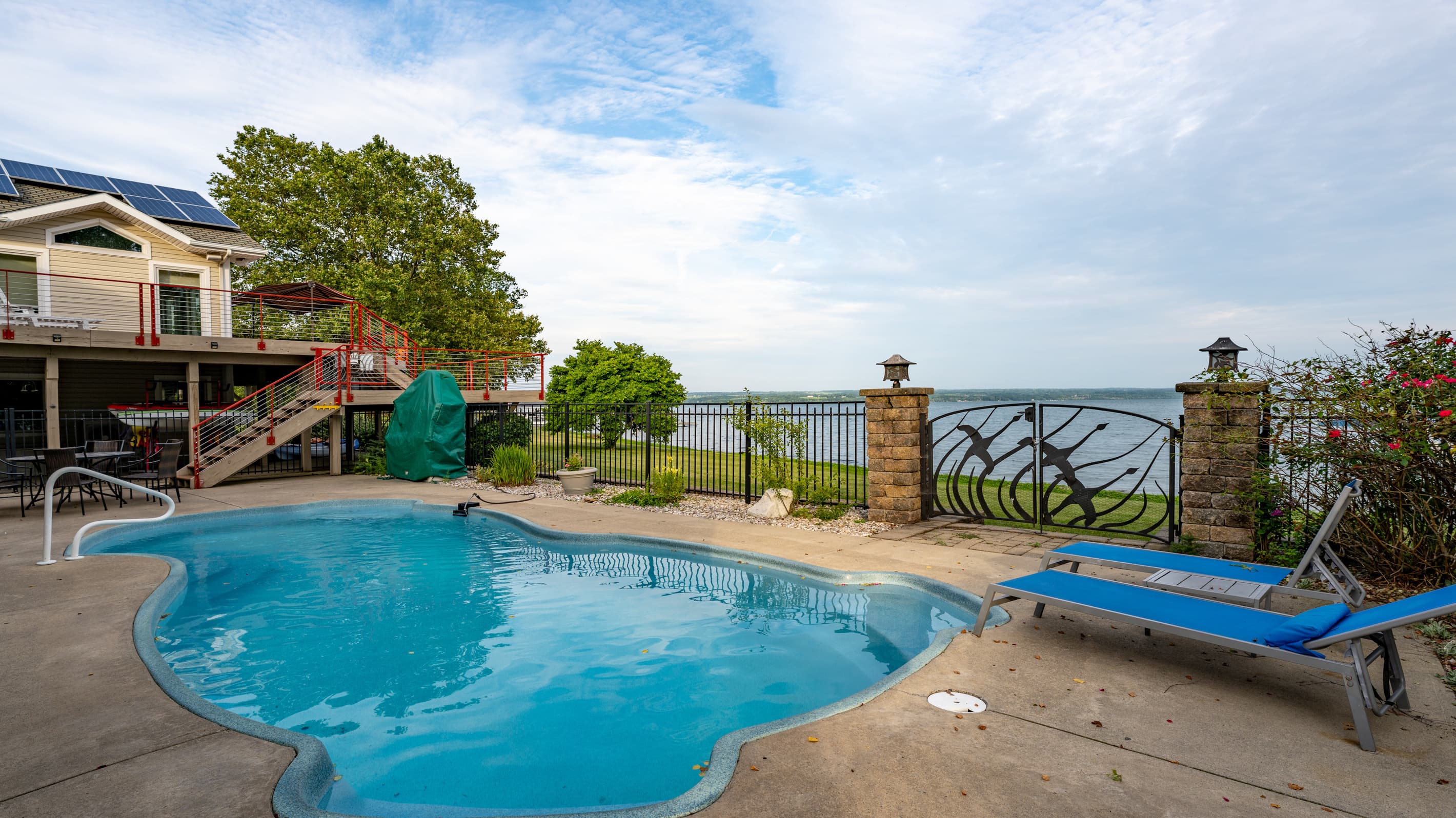 In-ground pool bordered by a stone deck