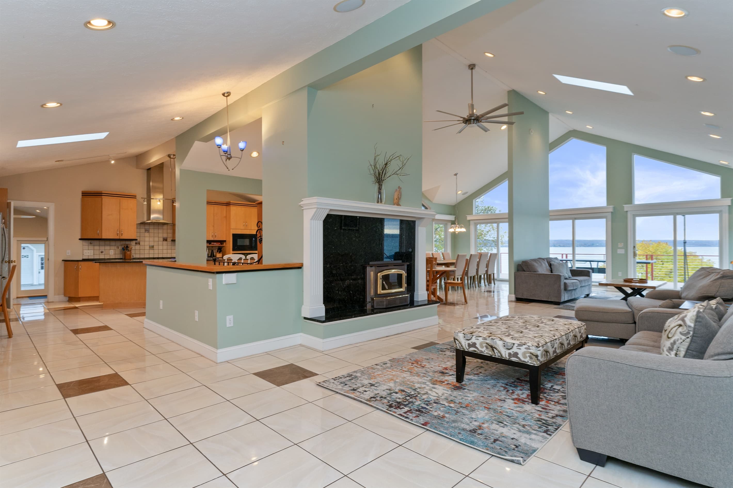 Living space with fireplace and open kitchen