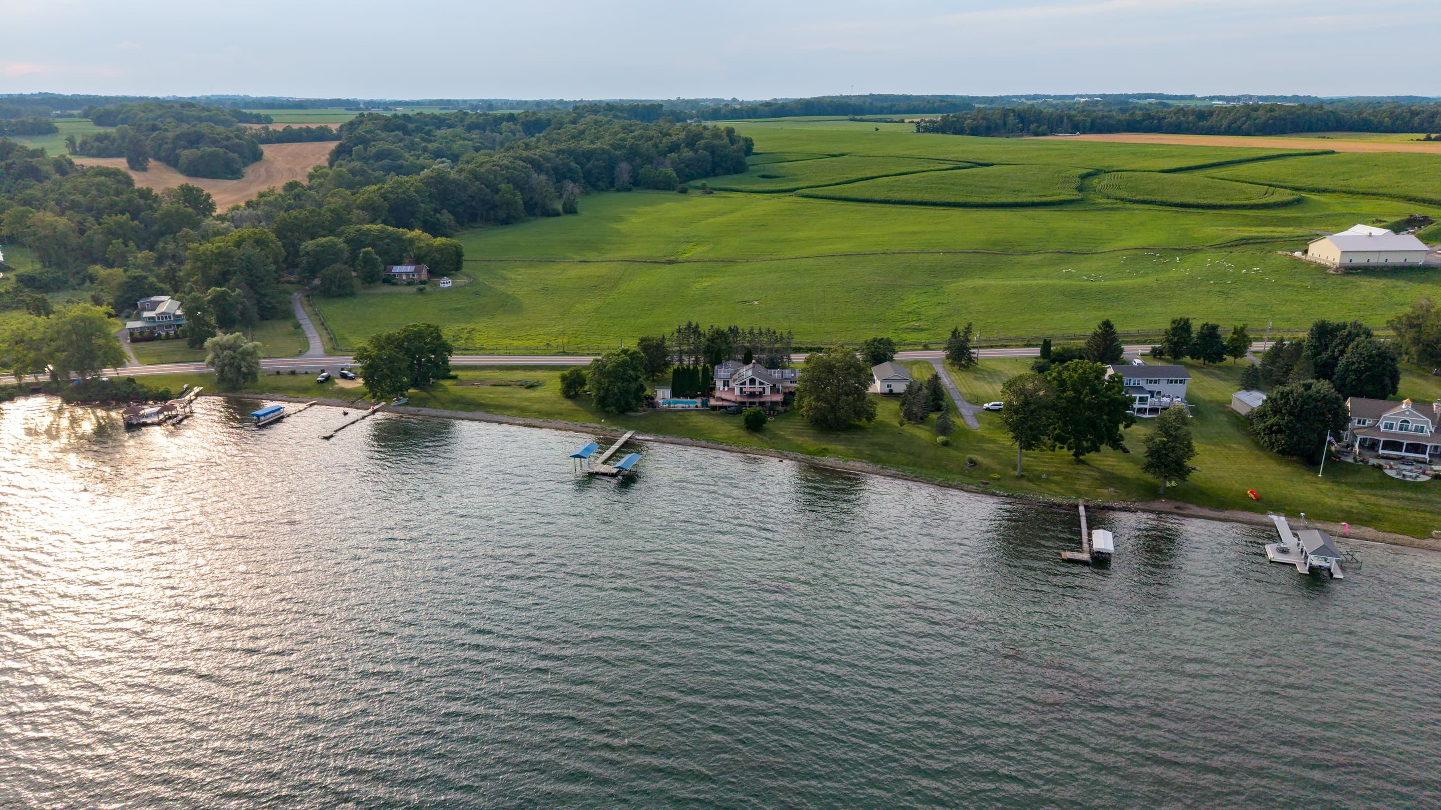 Waterfront neighborhood bordered by farmland