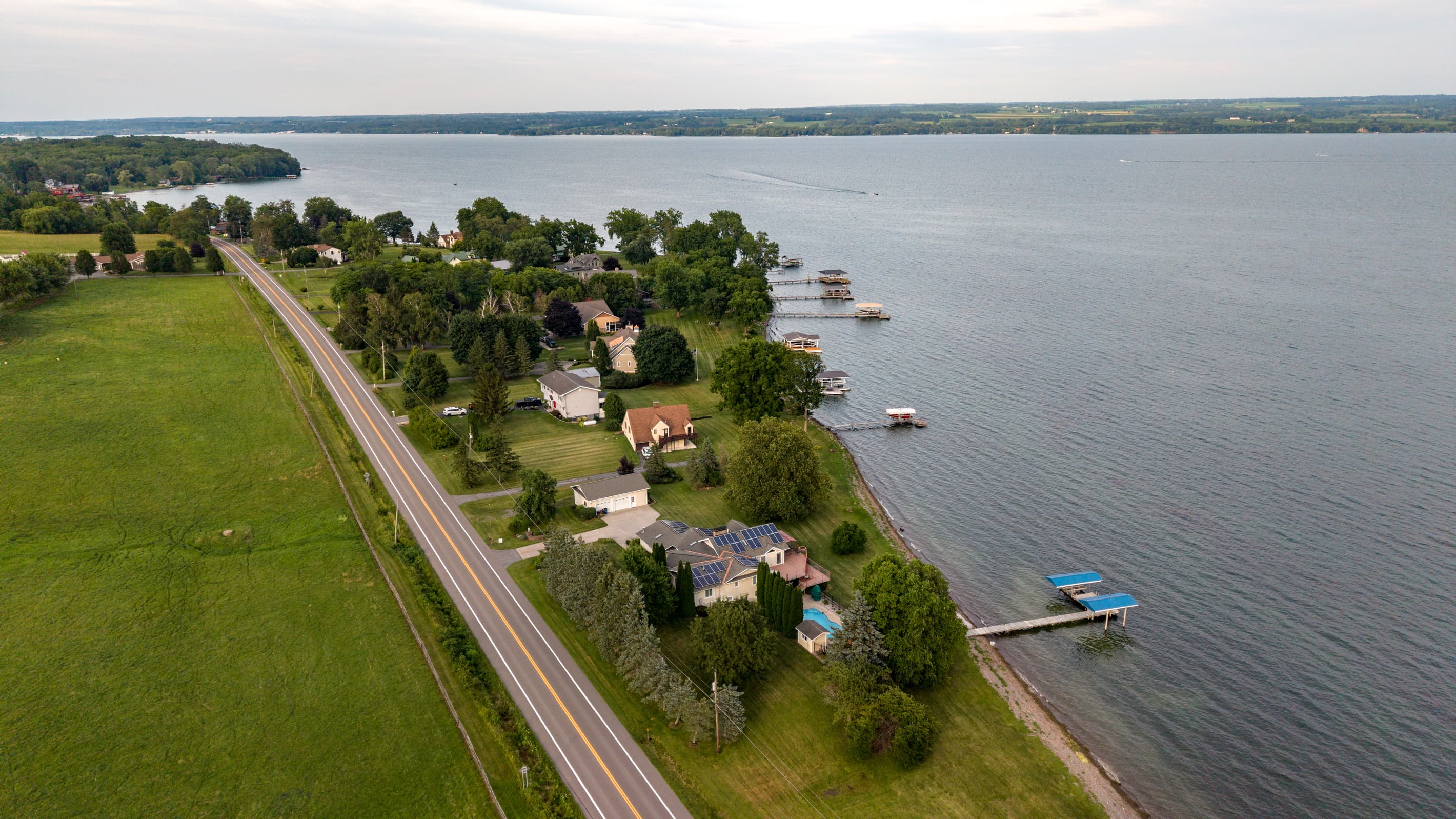 Aerial view along the narrow lakeside road
