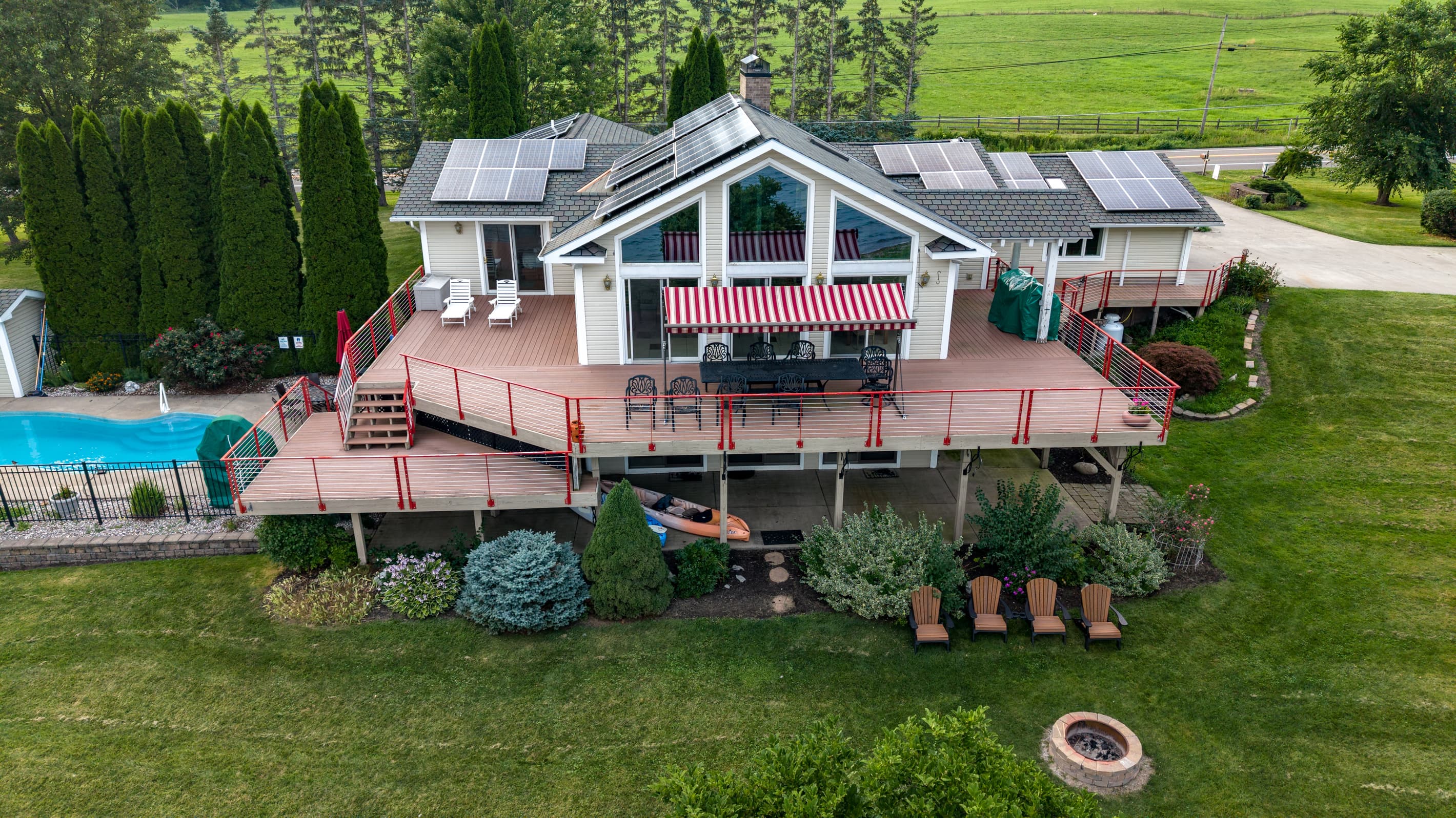 Multi-level deck overlooking fire pit seating