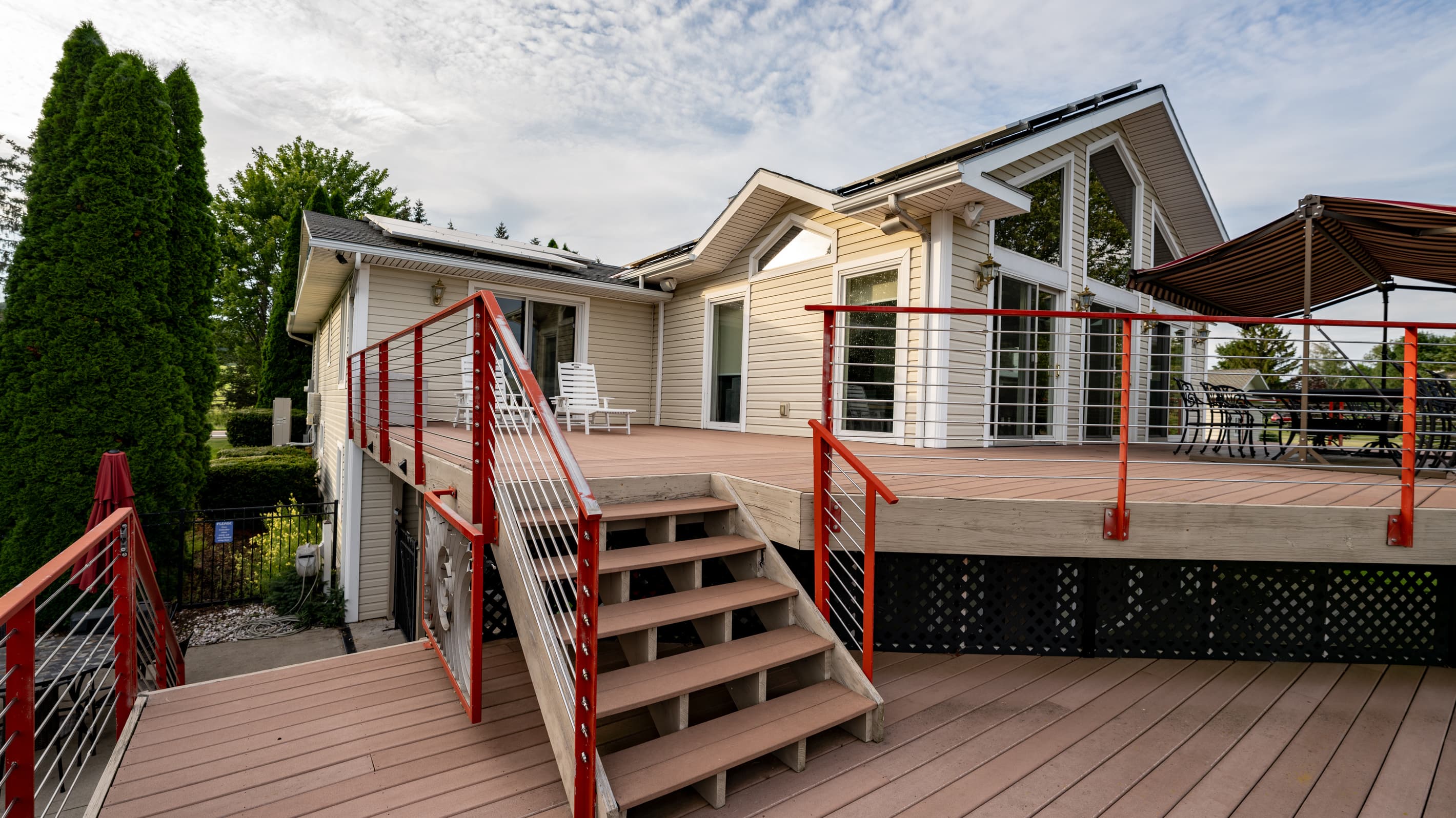Exterior staircase leading to the elevated deck
