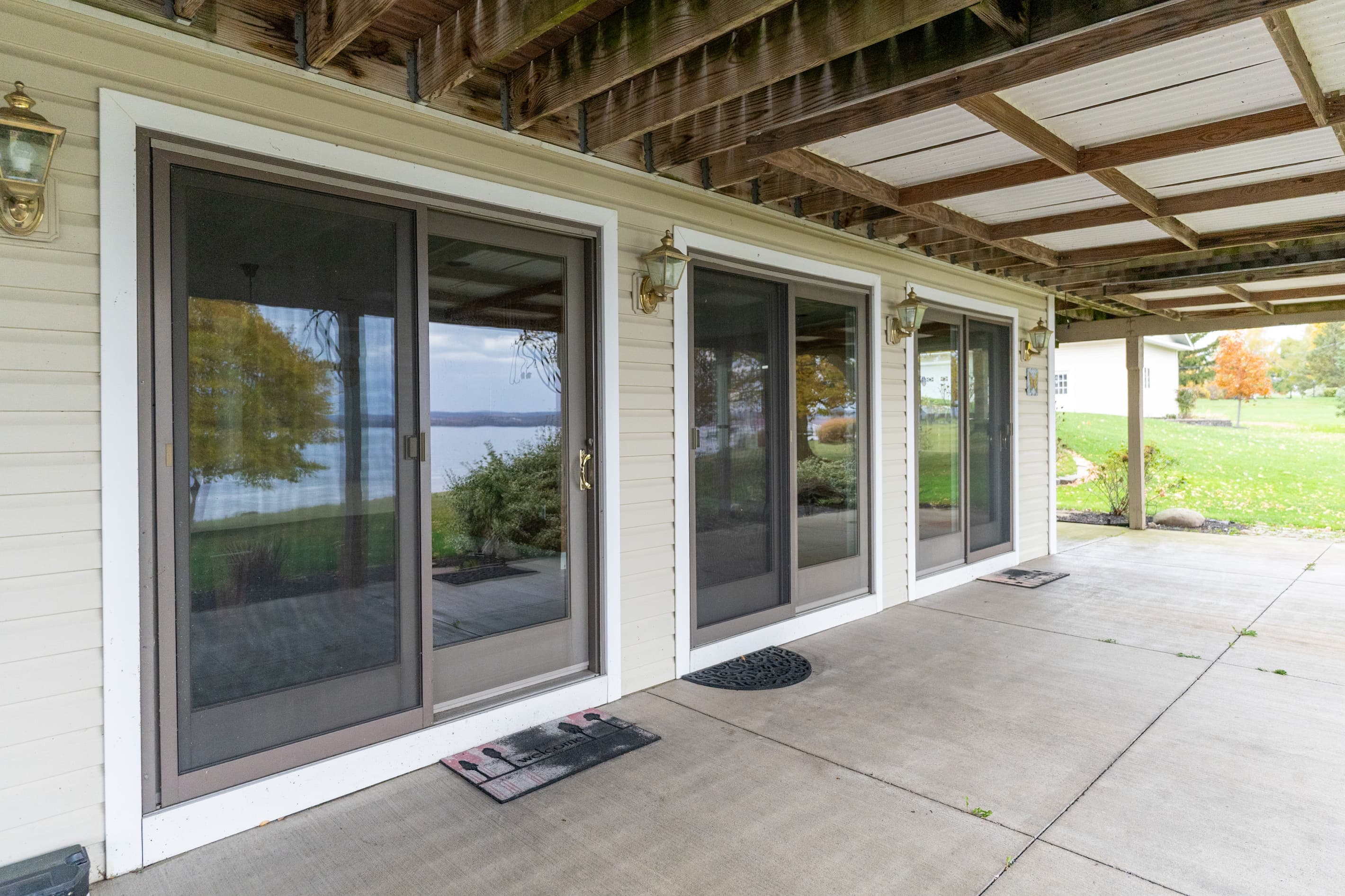 Covered patio with multiple sliding glass doors