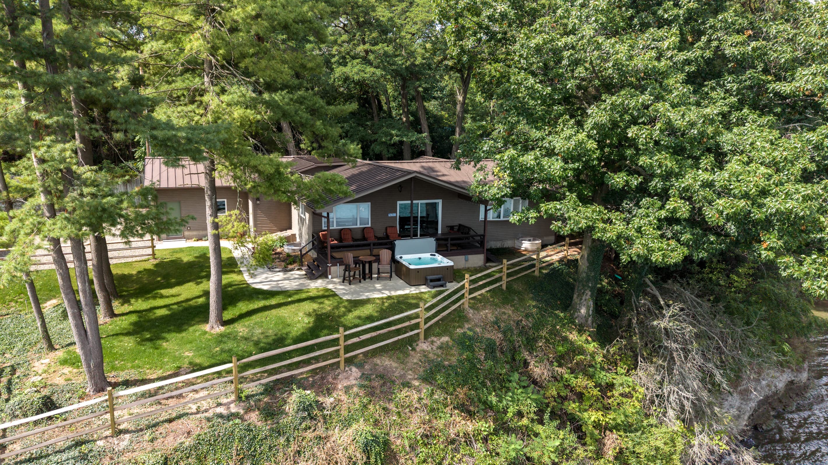 Lakefront home surrounded by mature trees