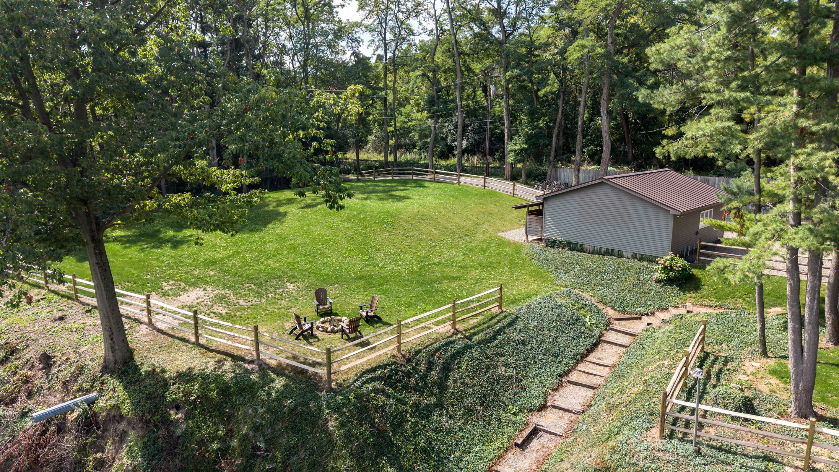 Lakefront lawn and detached garage