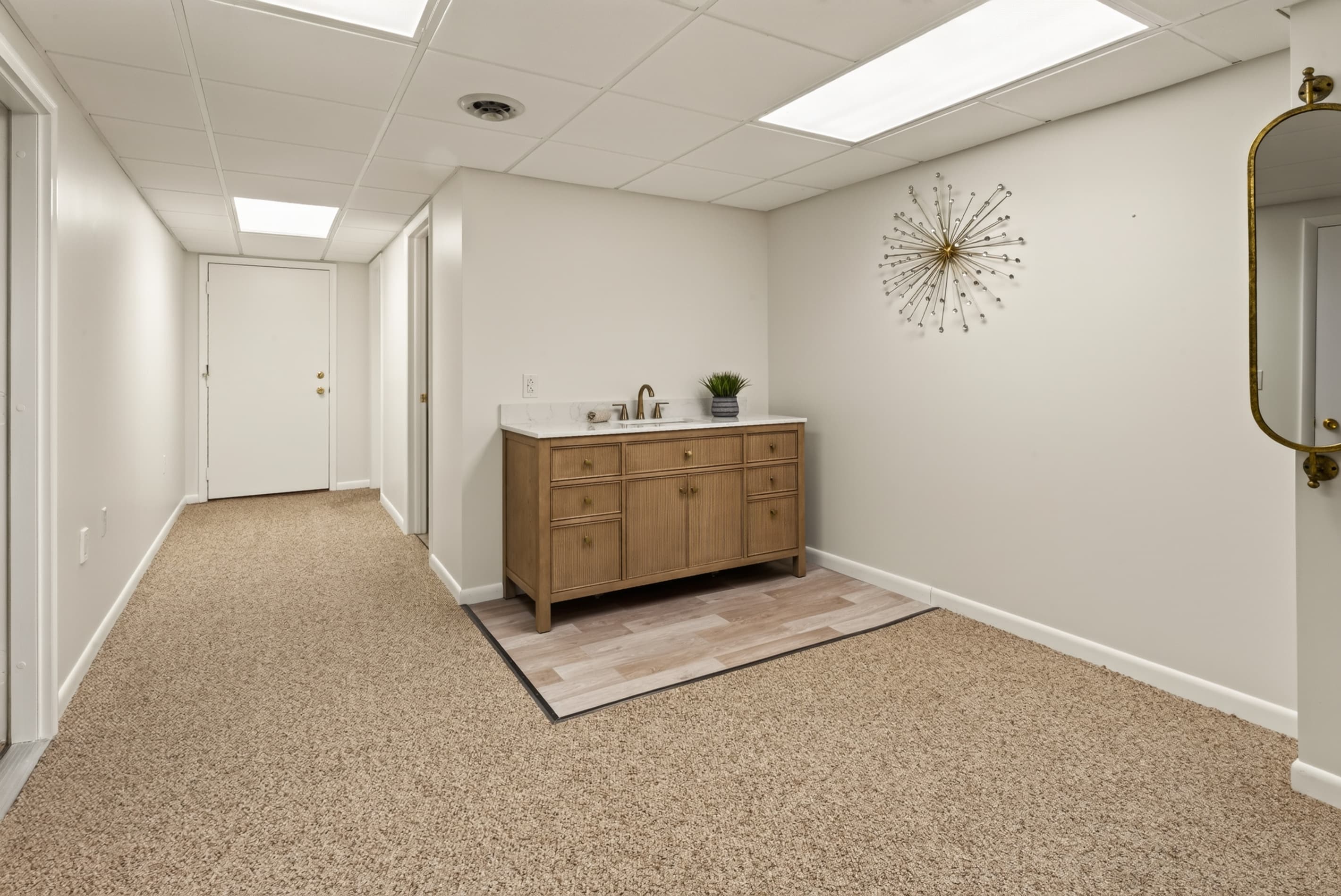 Lower-level hallway with dresser