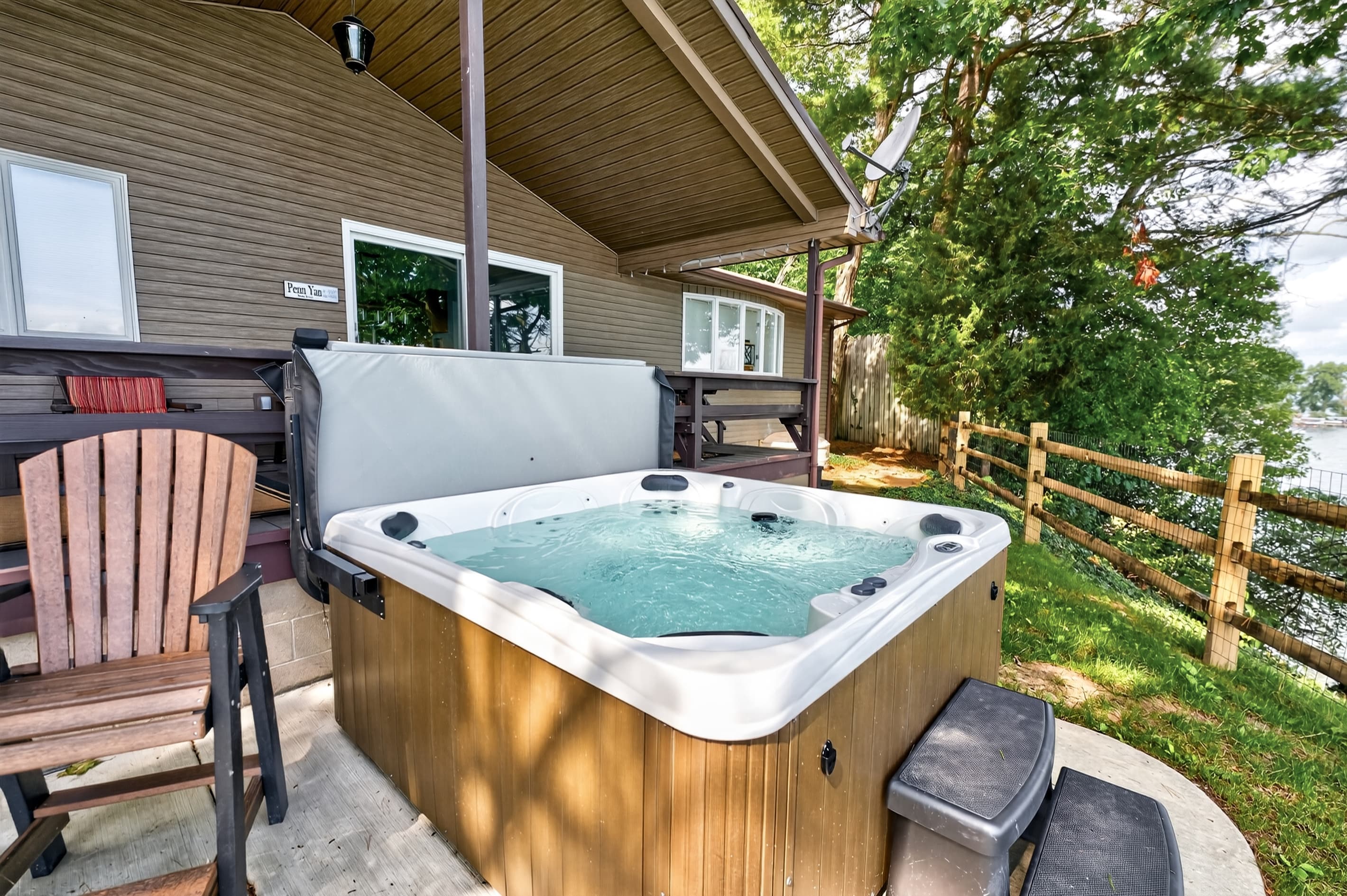 Hot tub beneath the covered porch