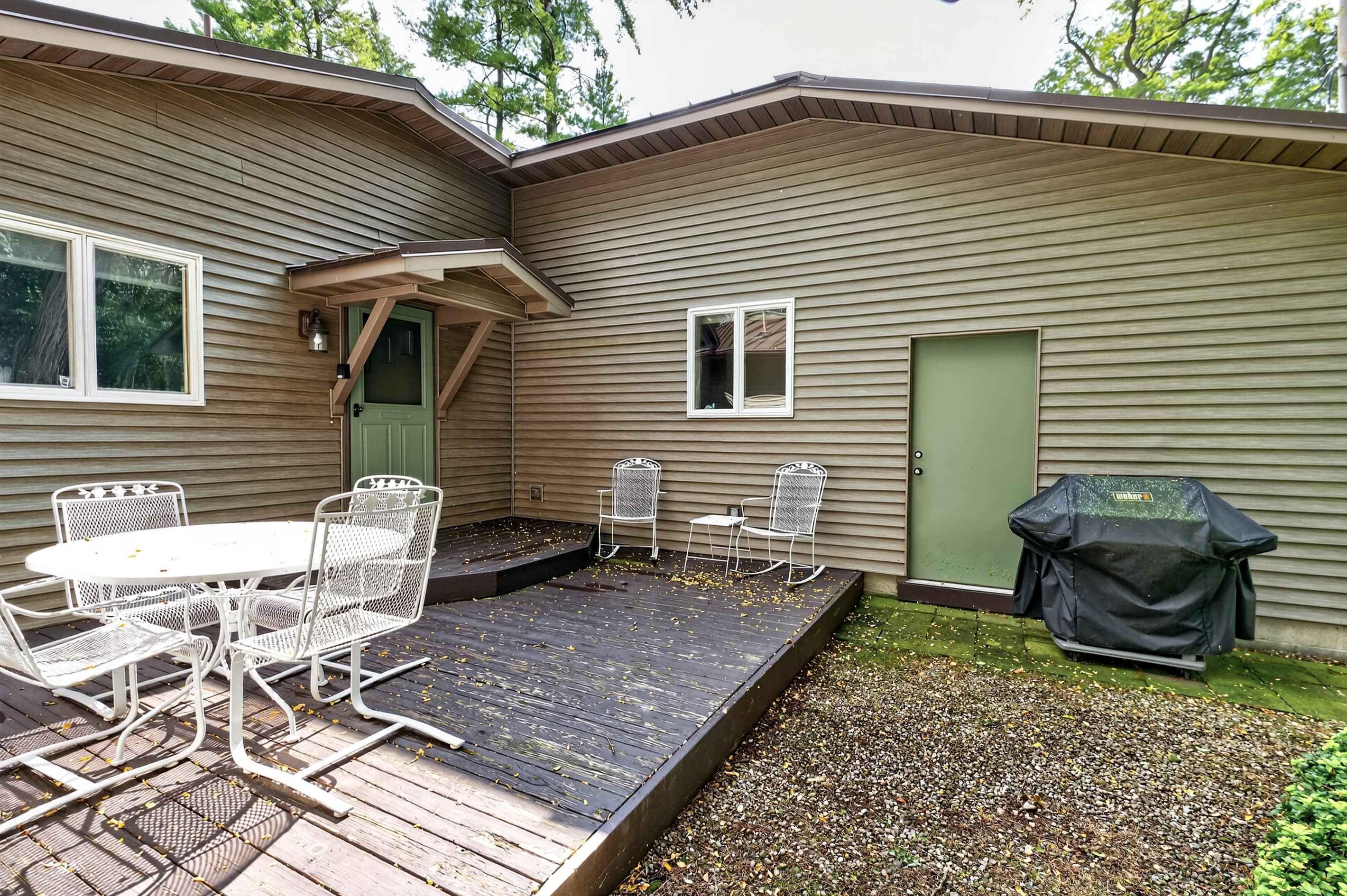Patio with outdoor dining and grill