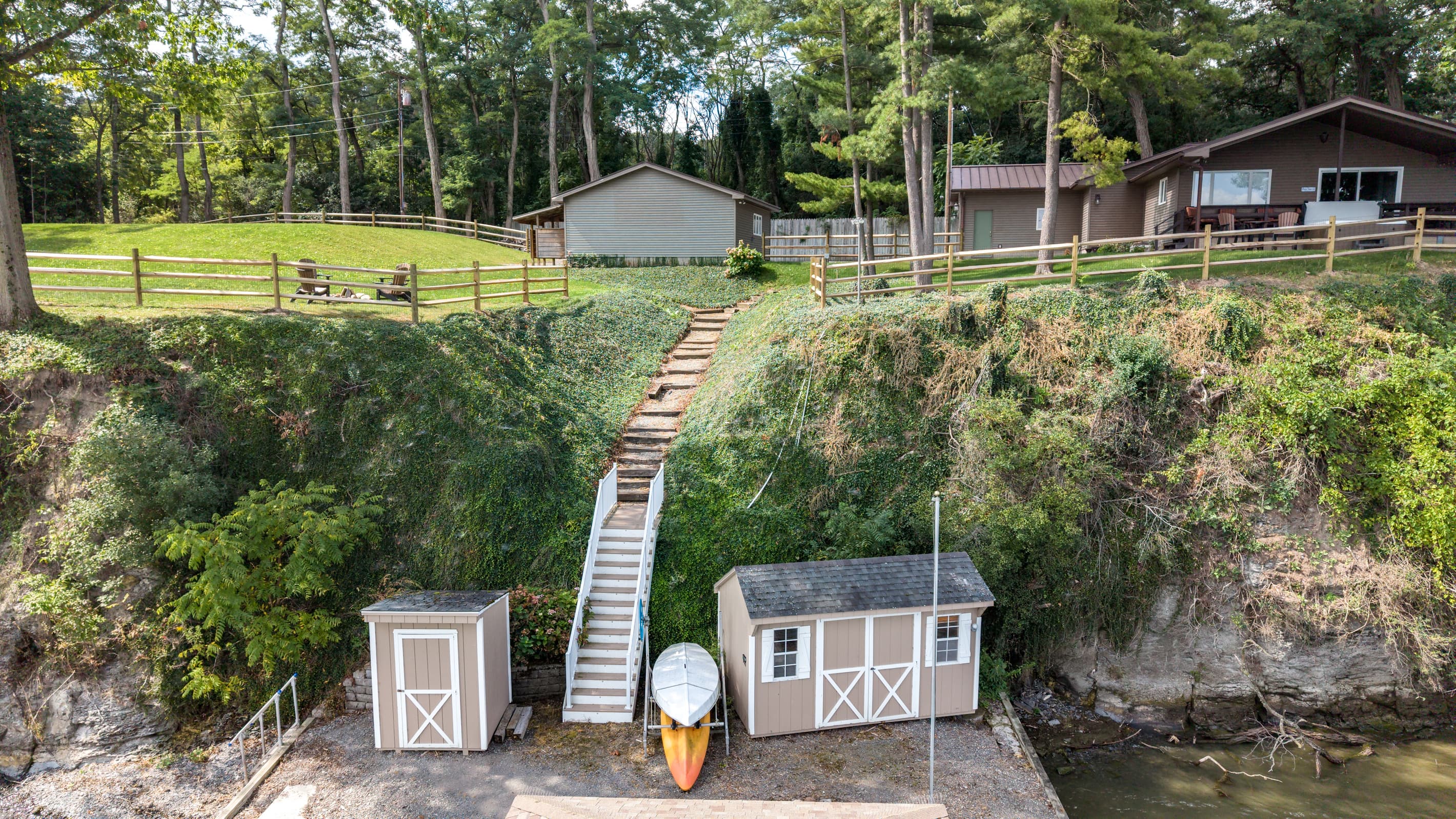 Waterfront stairs with storage sheds