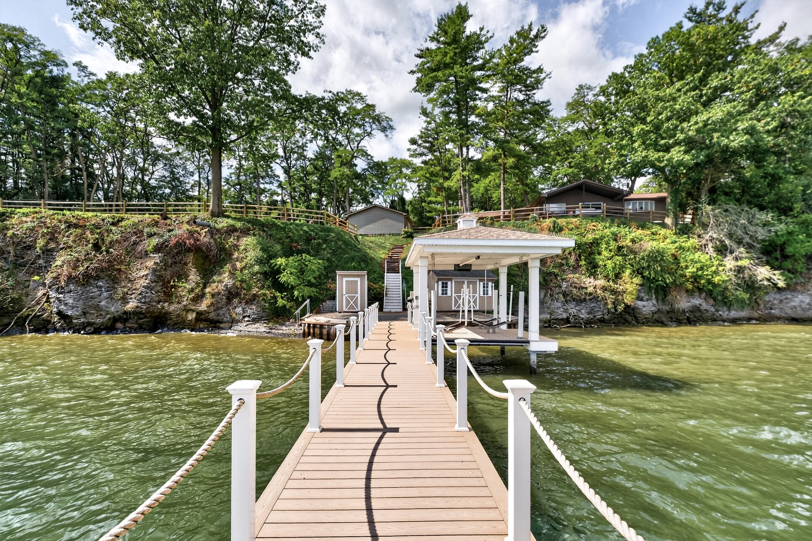 Dock walkway leading toward the property