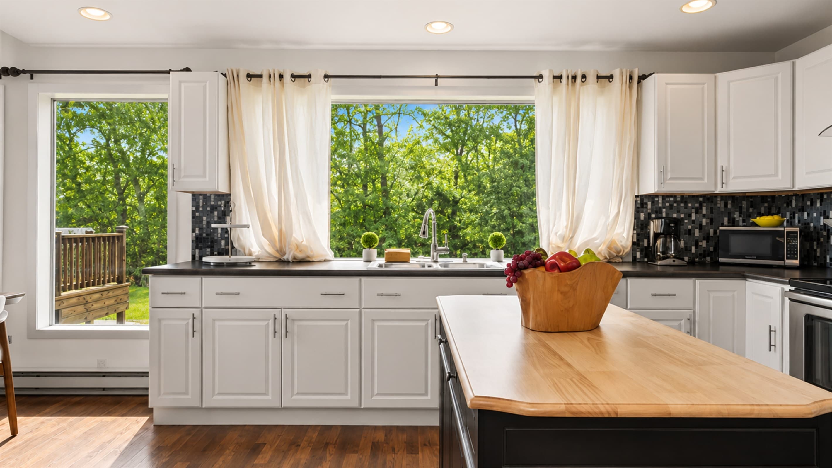 Kitchen sink overlooking the wooded yard