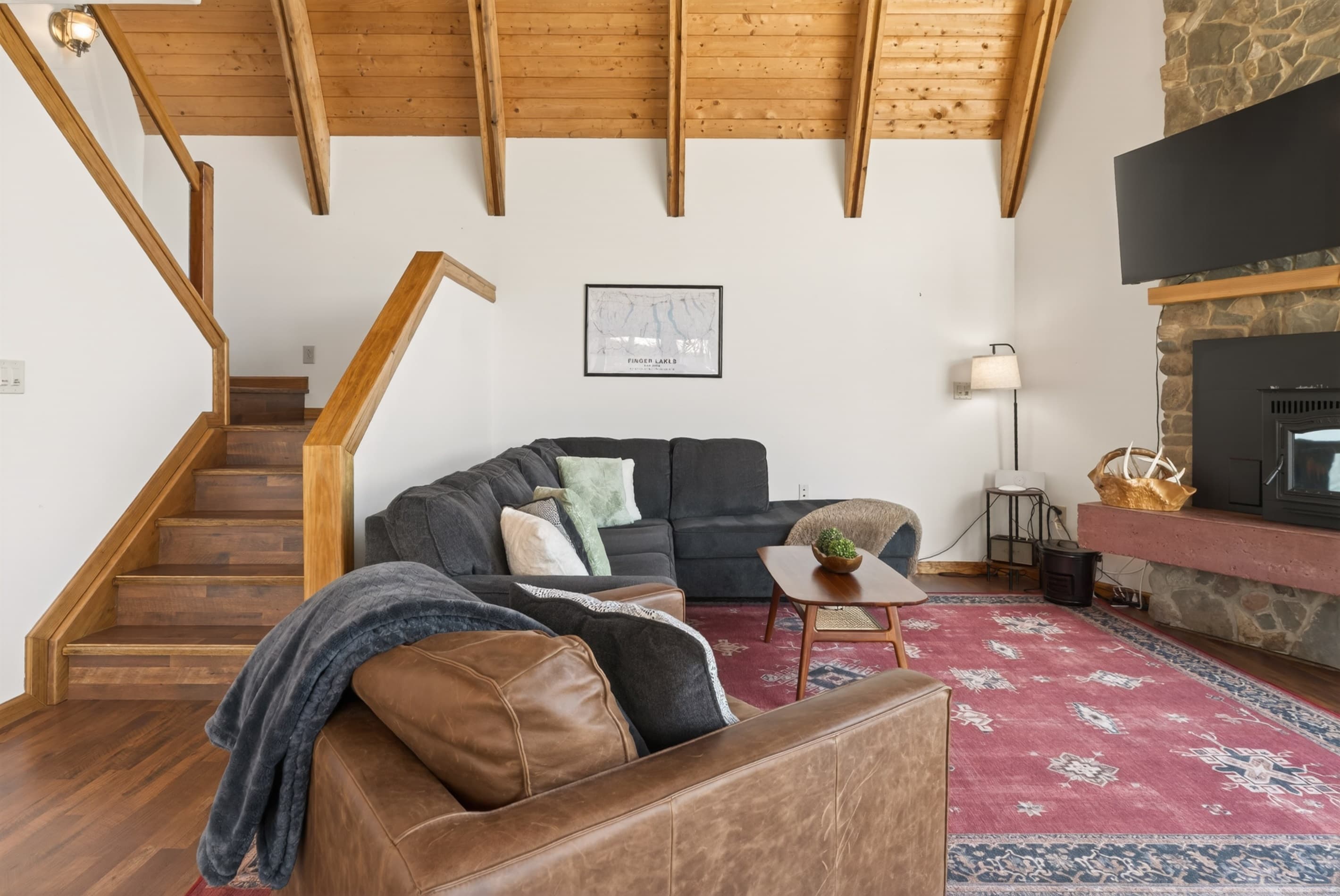 Living area beneath the open staircase