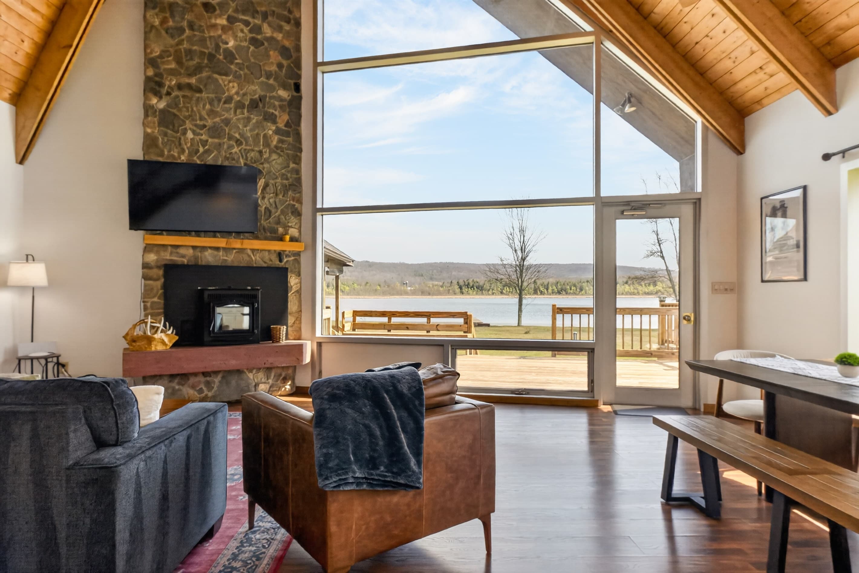 Open living area with stone fireplace