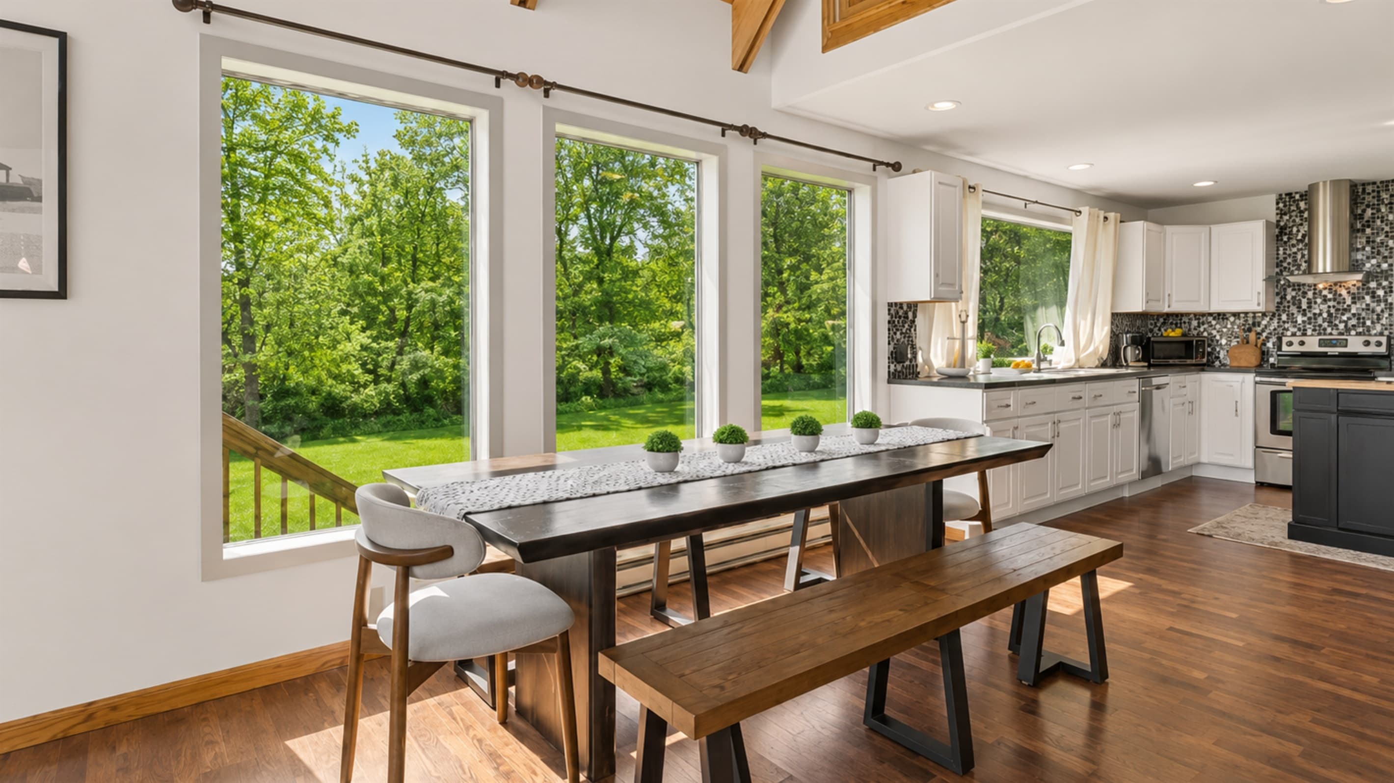 Window-lined dining area beside the kitchen