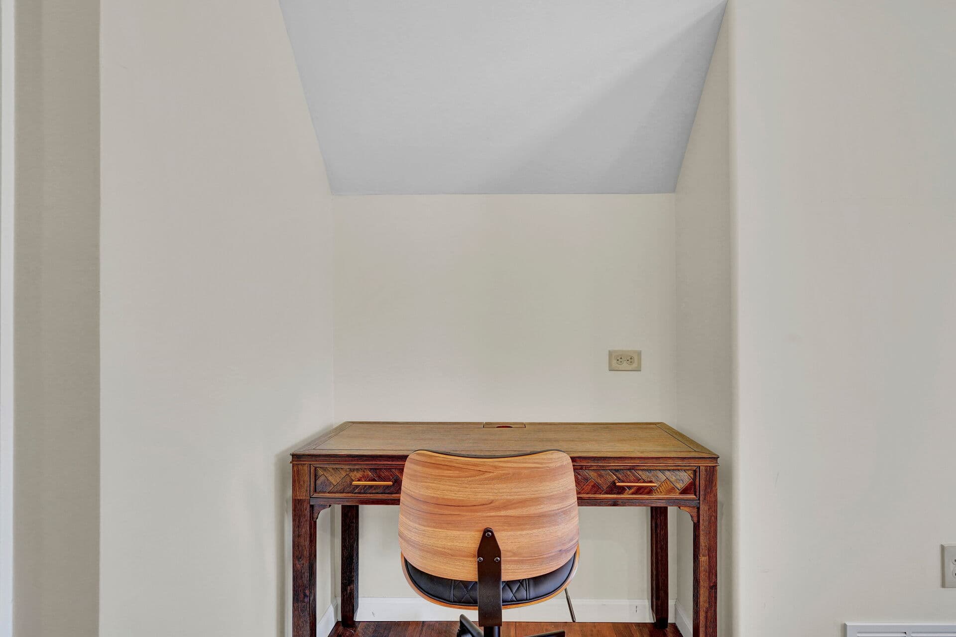 Compact desk in a quiet alcove