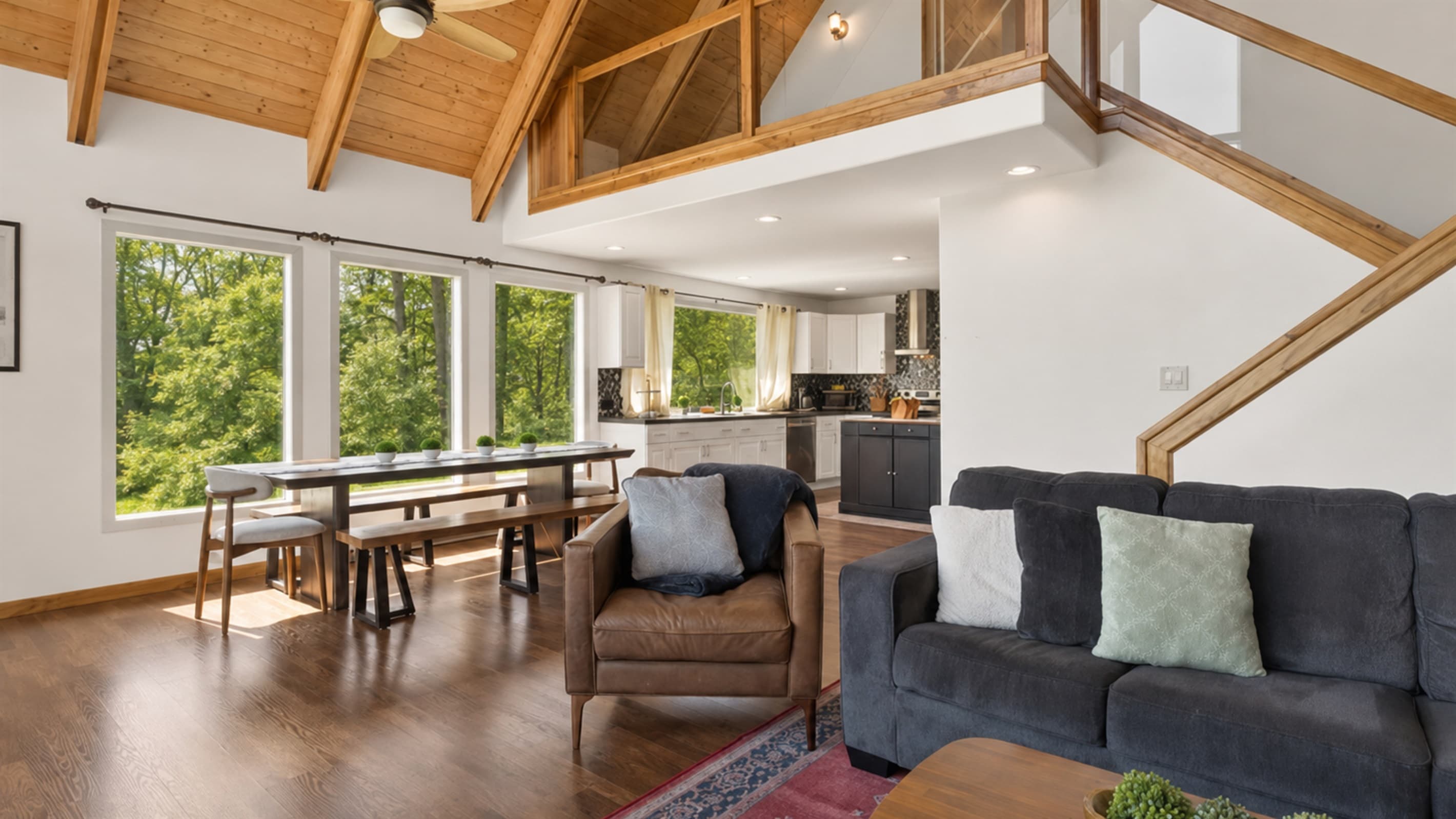 Window-lined lounge with multiple seating areas