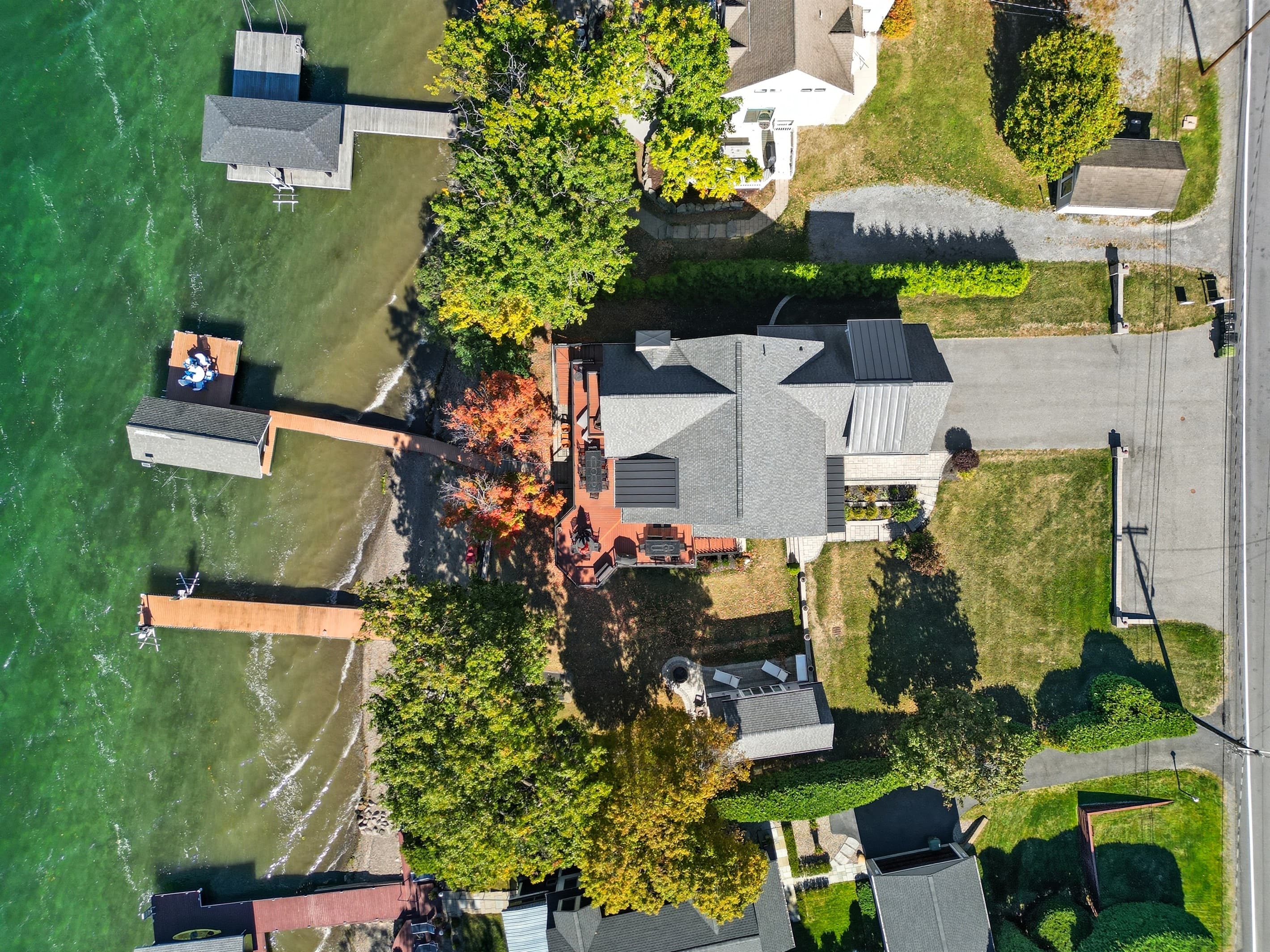 Overhead view of house, lawn, and dock