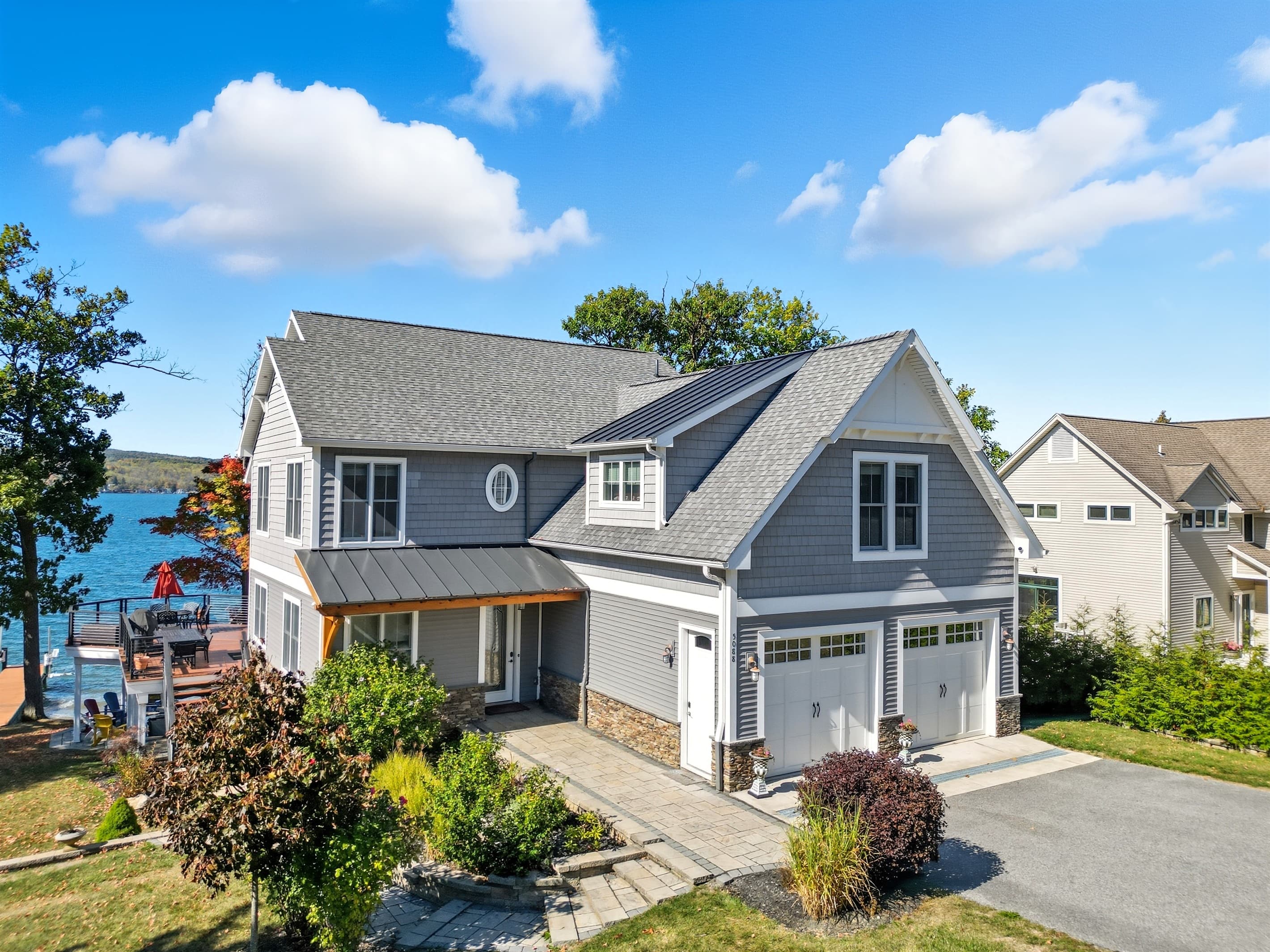 Street-facing exterior with attached garage