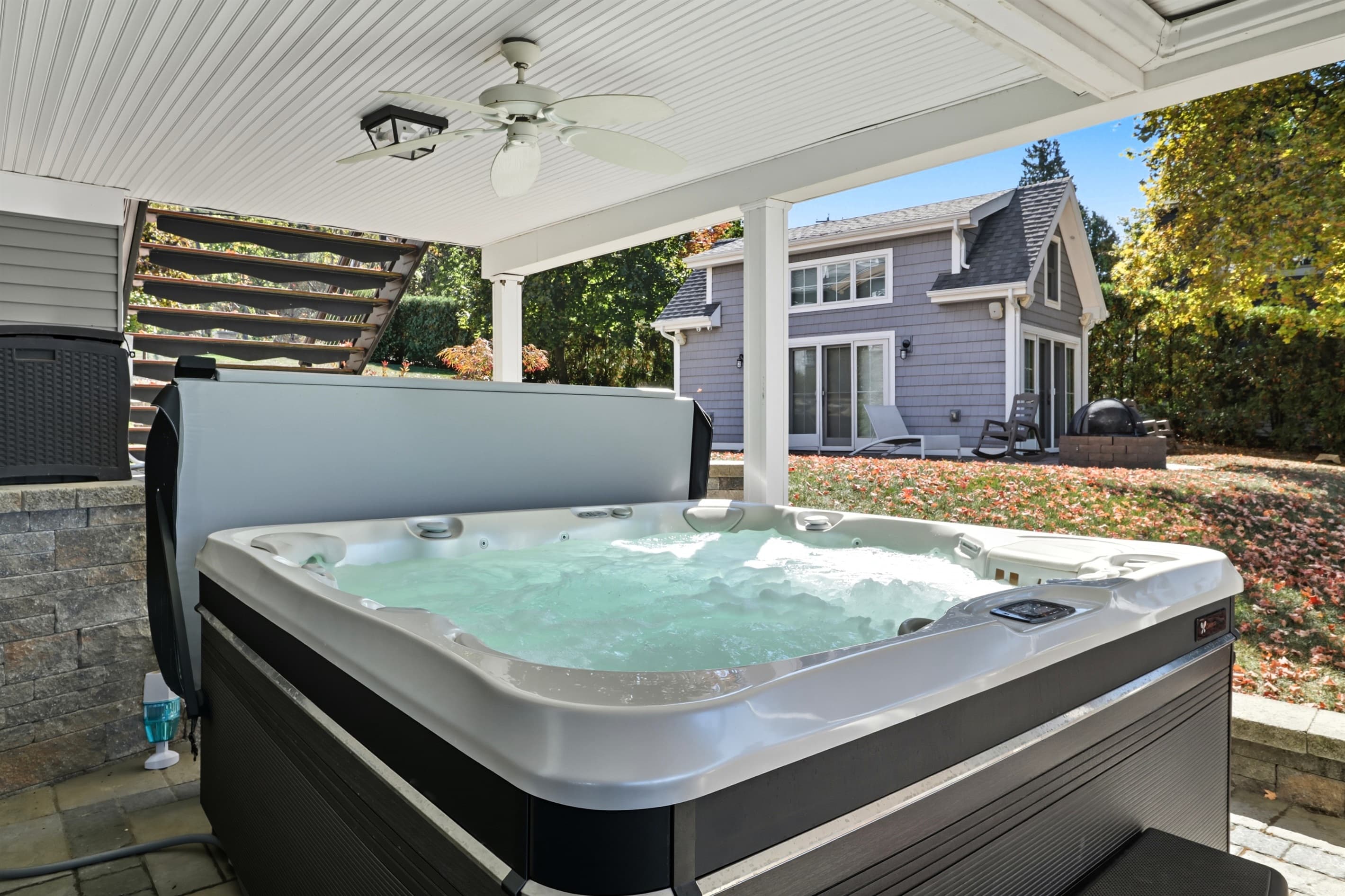 Hot tub beneath covered patio