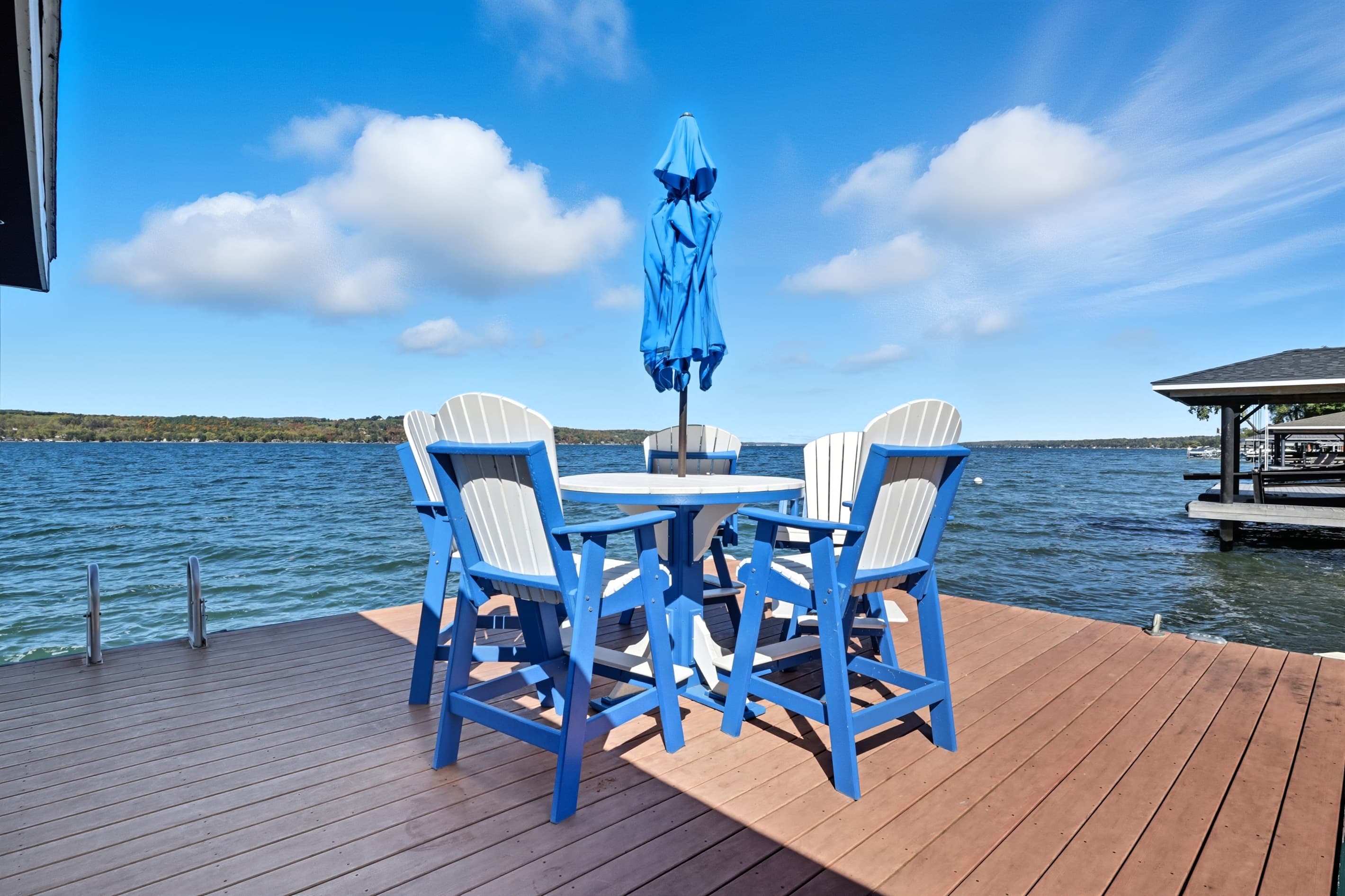 Blue dining set positioned on dock