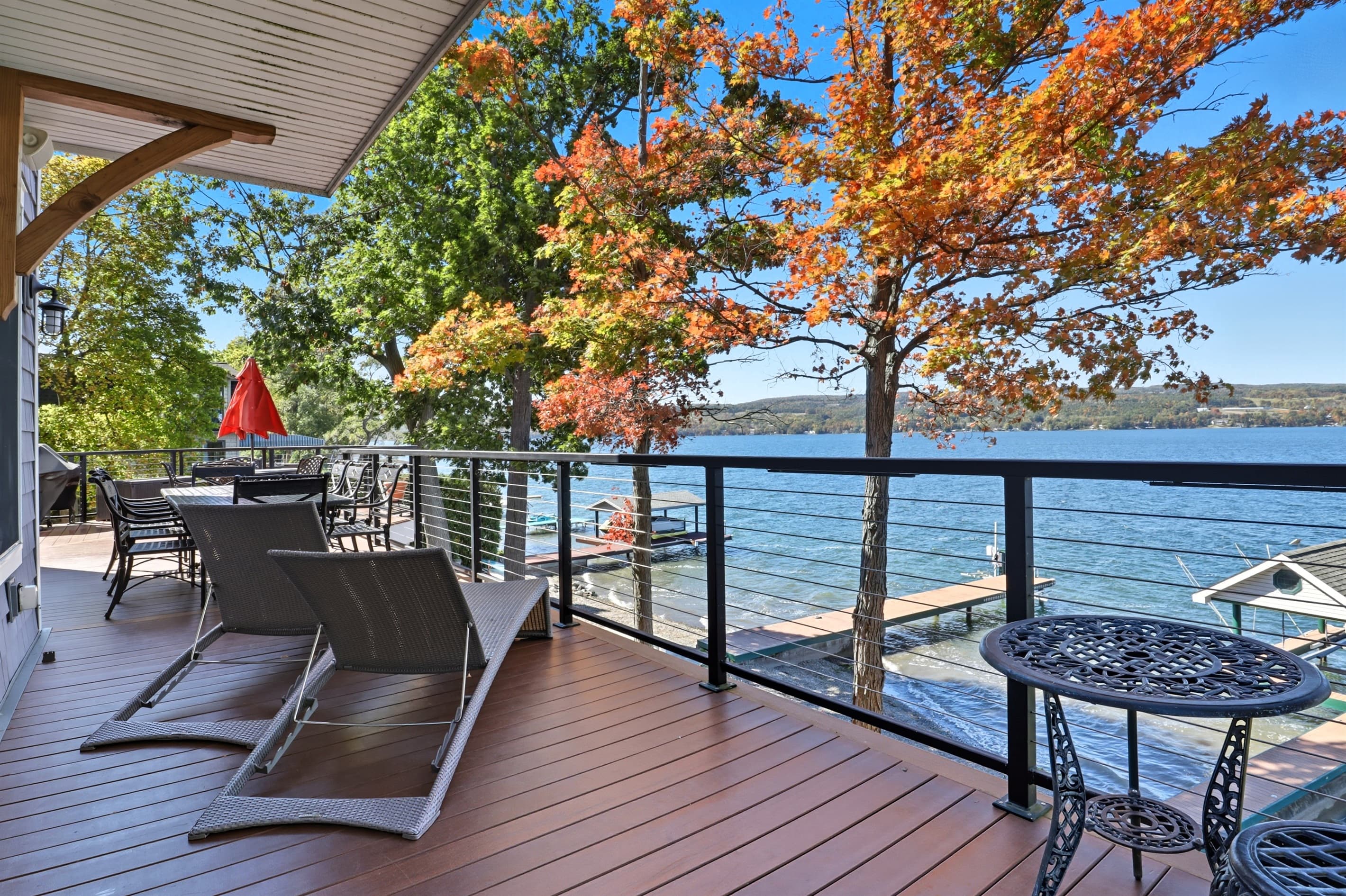 Deck with lounge chair and lake views