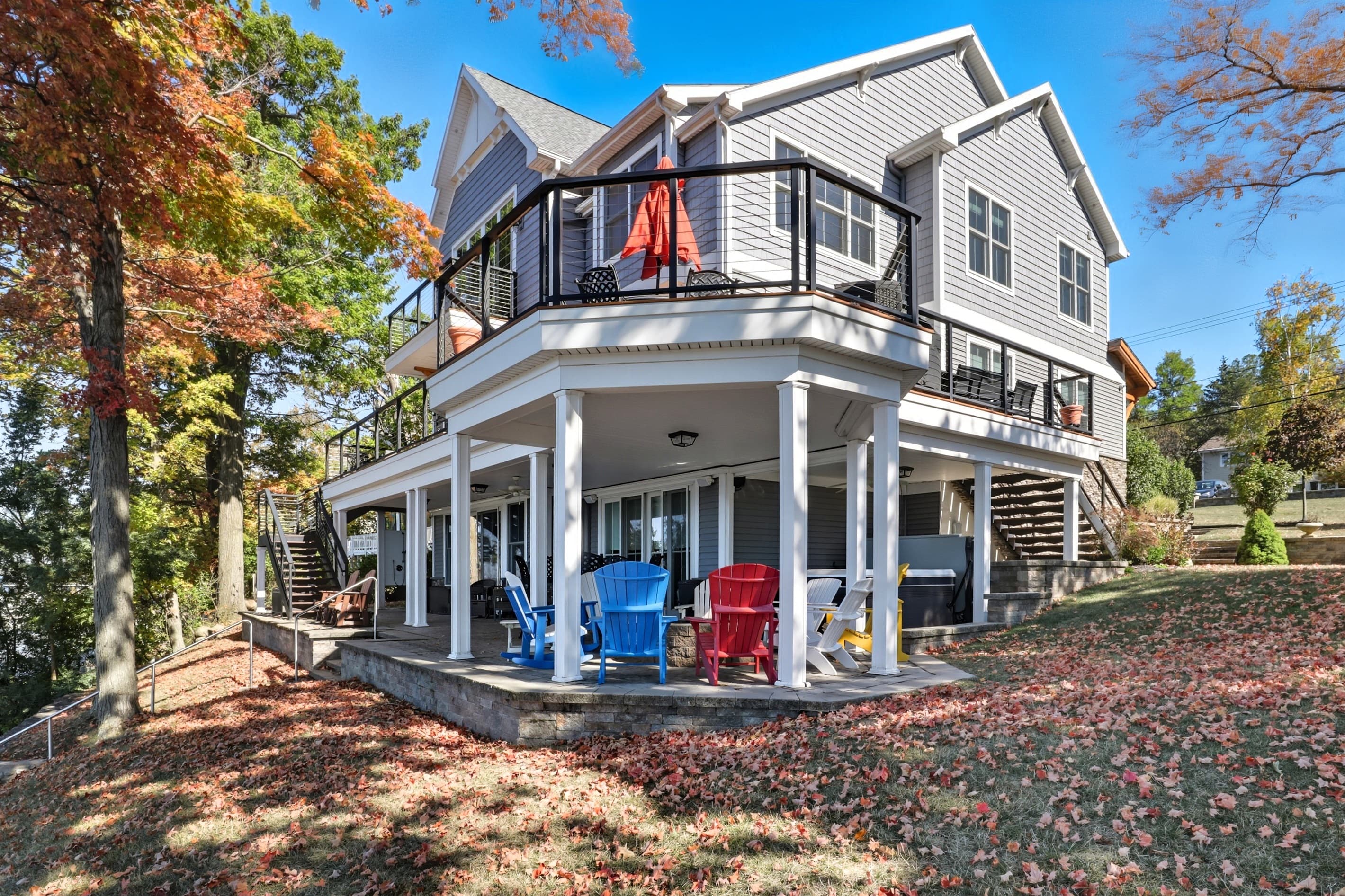 Lake-facing exterior with wraparound porch
