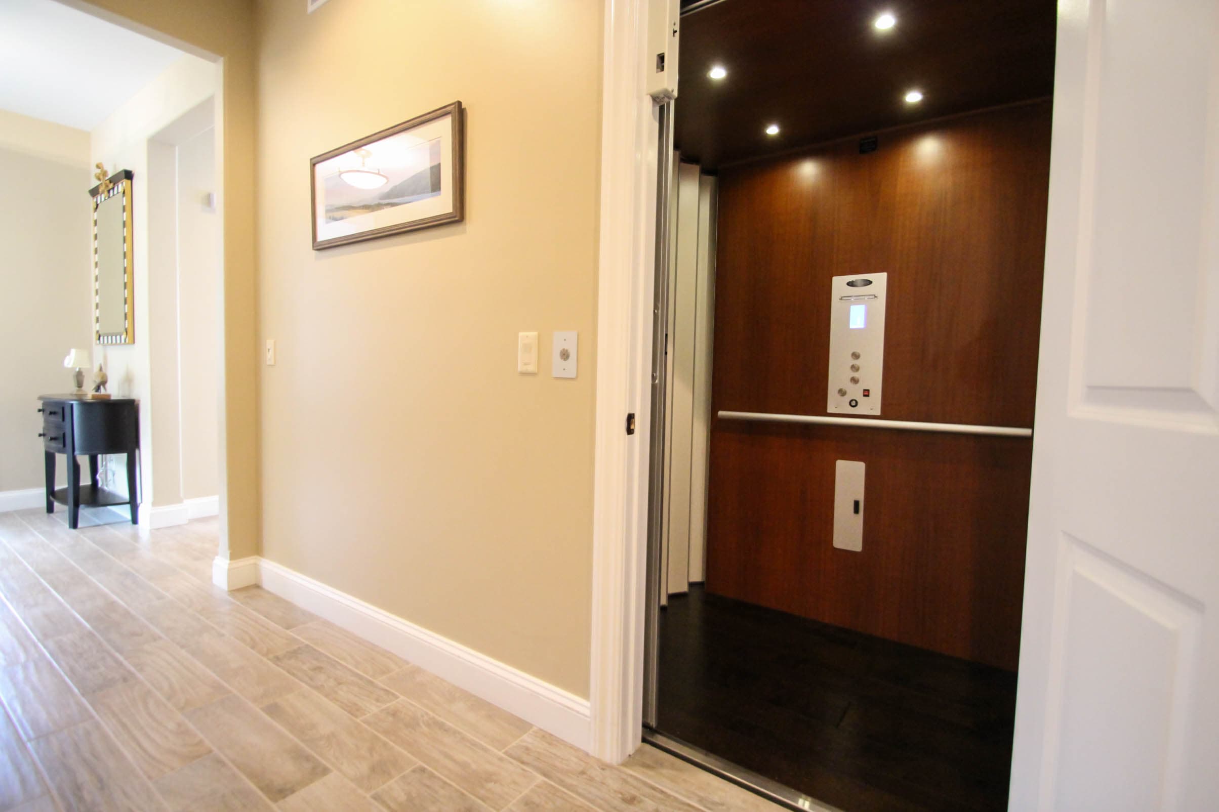 Private elevator with wood-paneled interior