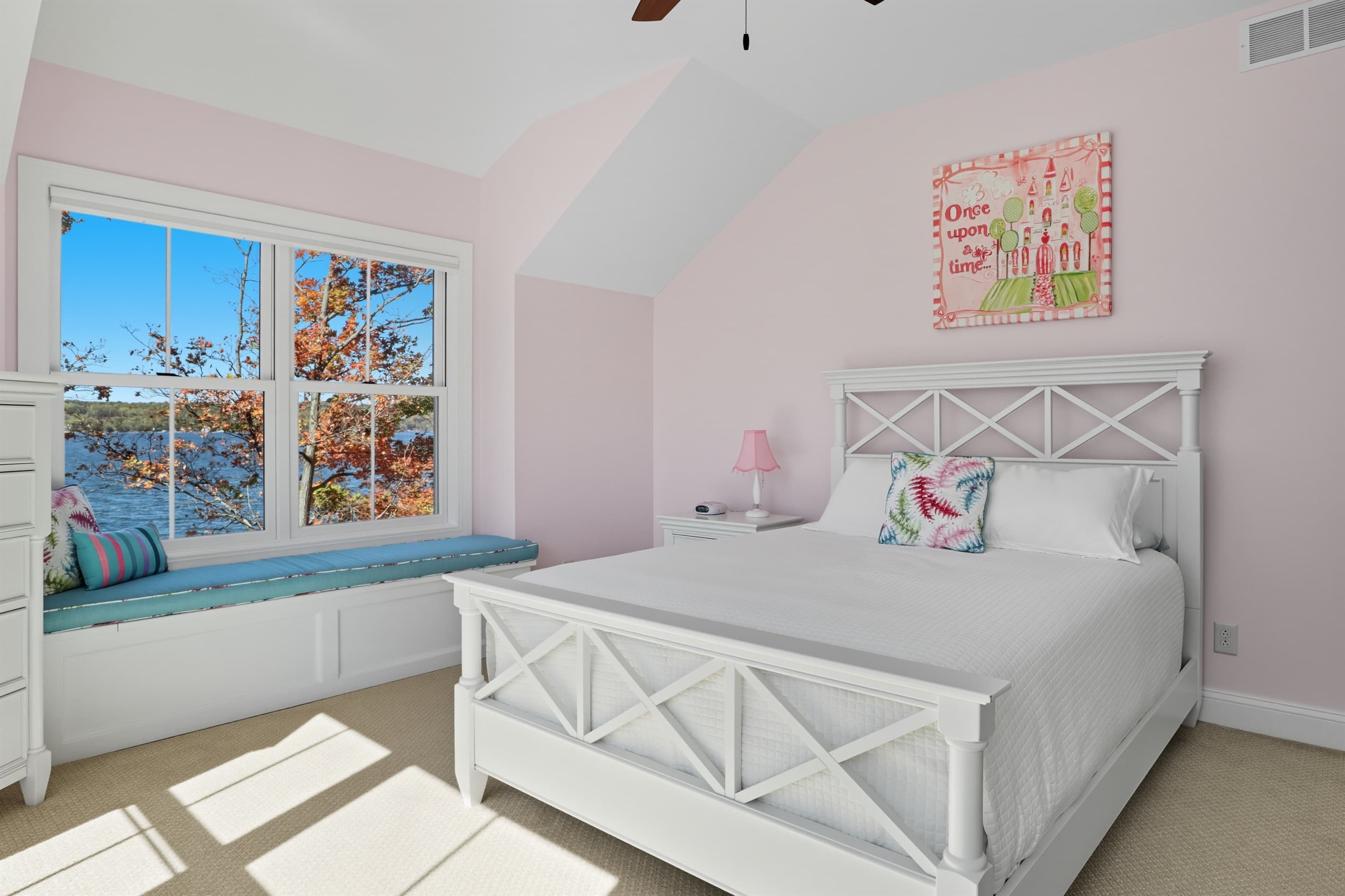Bedroom with white bed frame