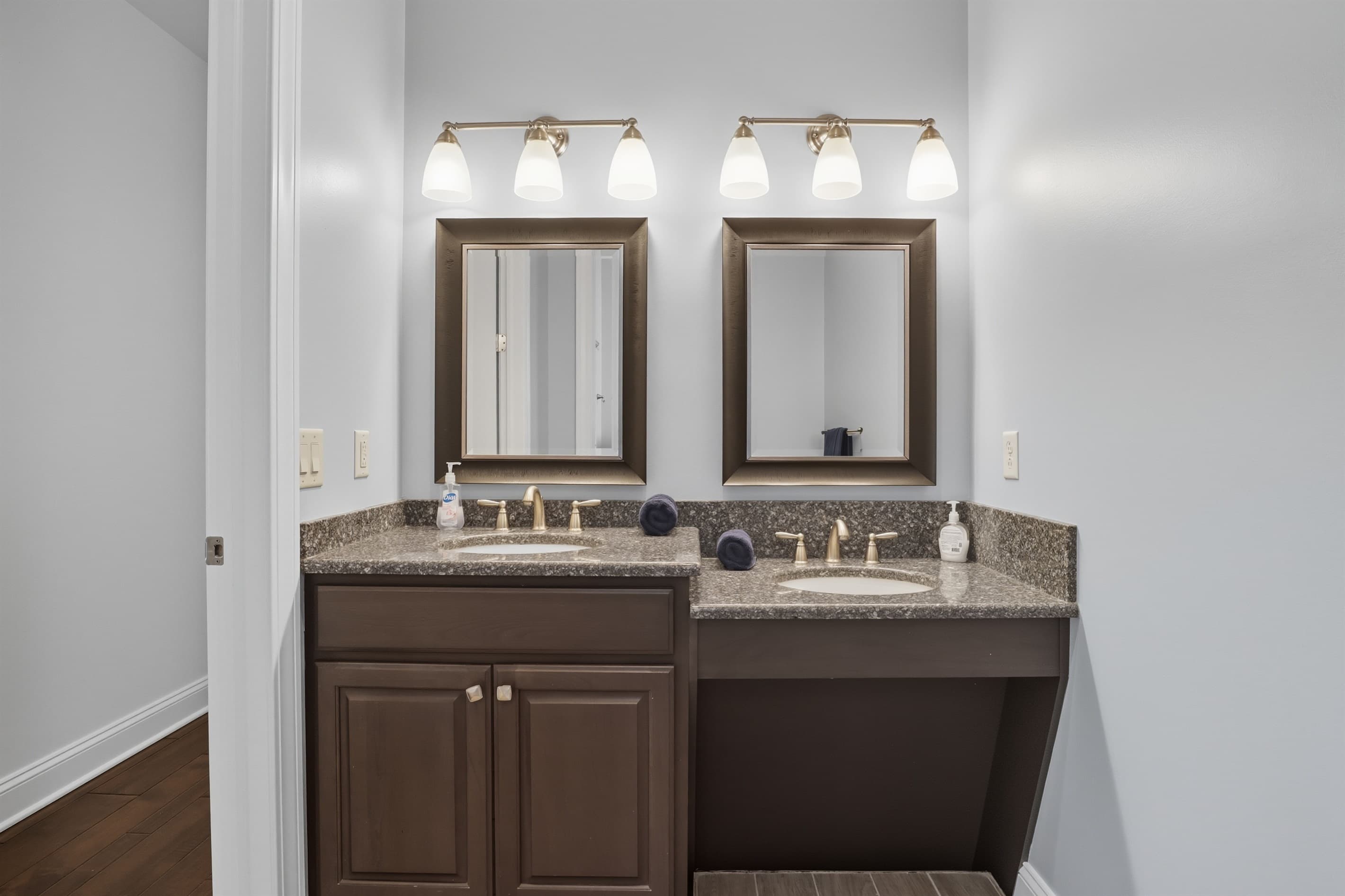 Double vanity with matching framed mirrors