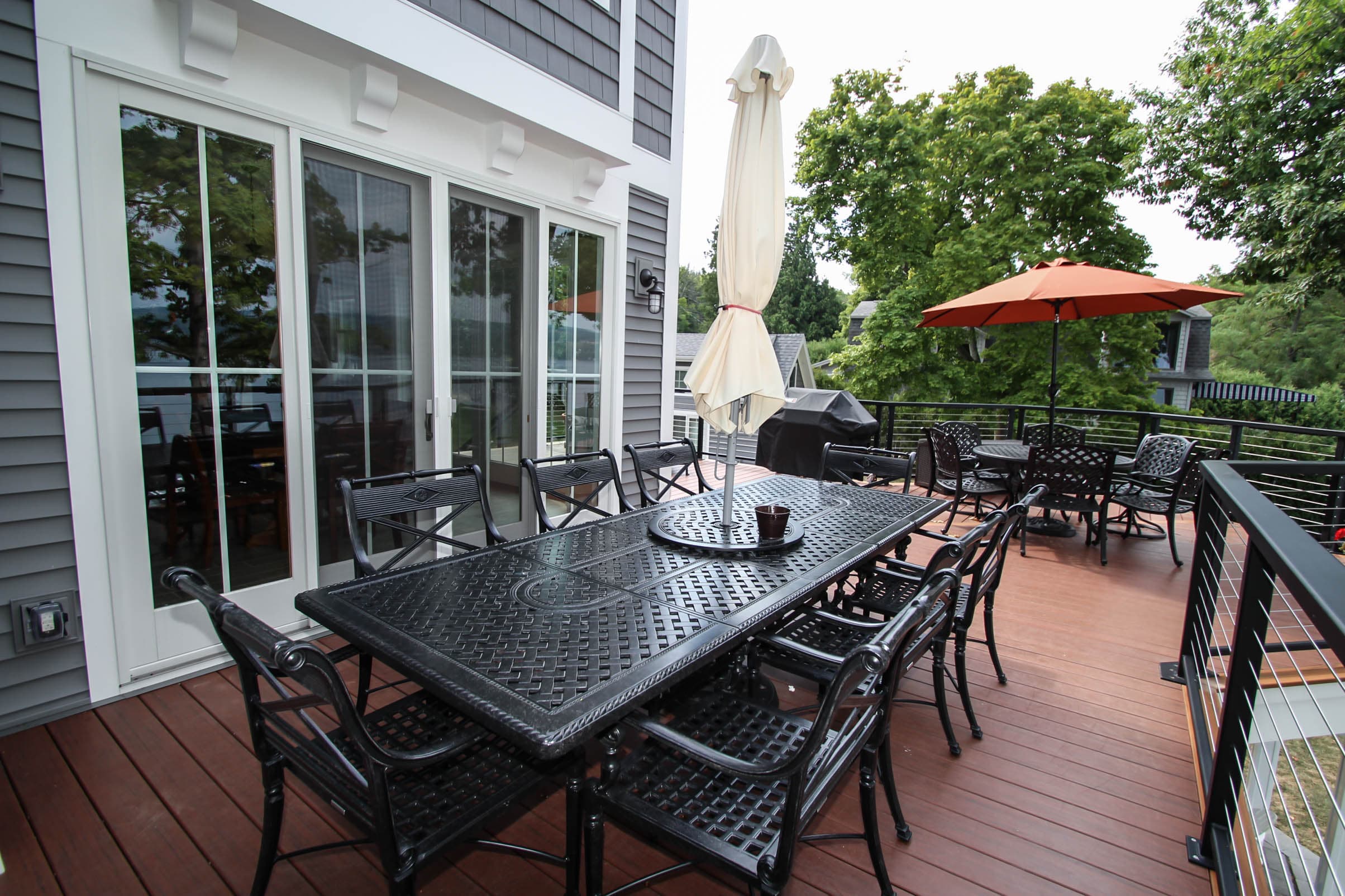 Patio dining tables beside exterior doors