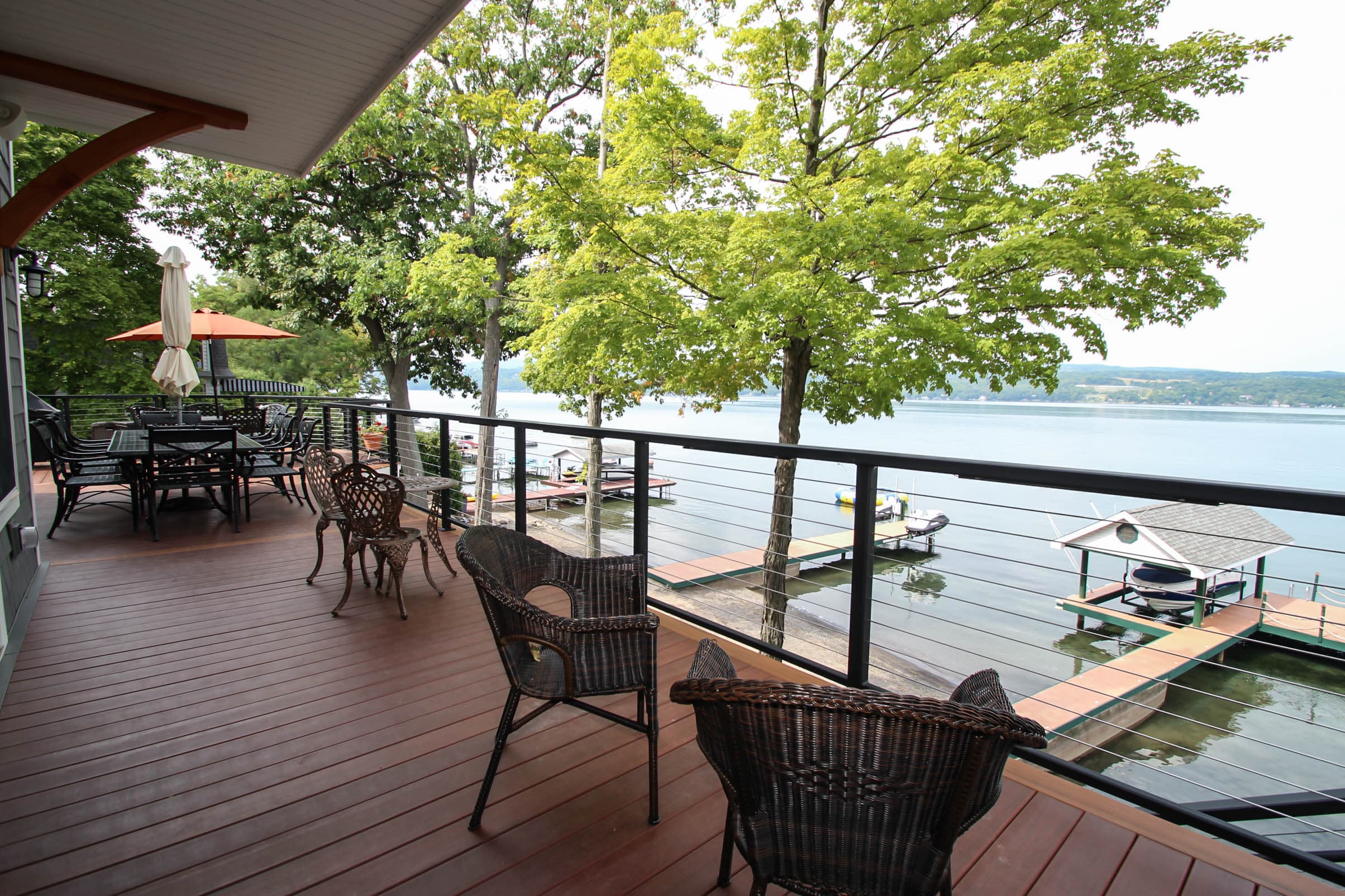 Deck dining area overlooking the water