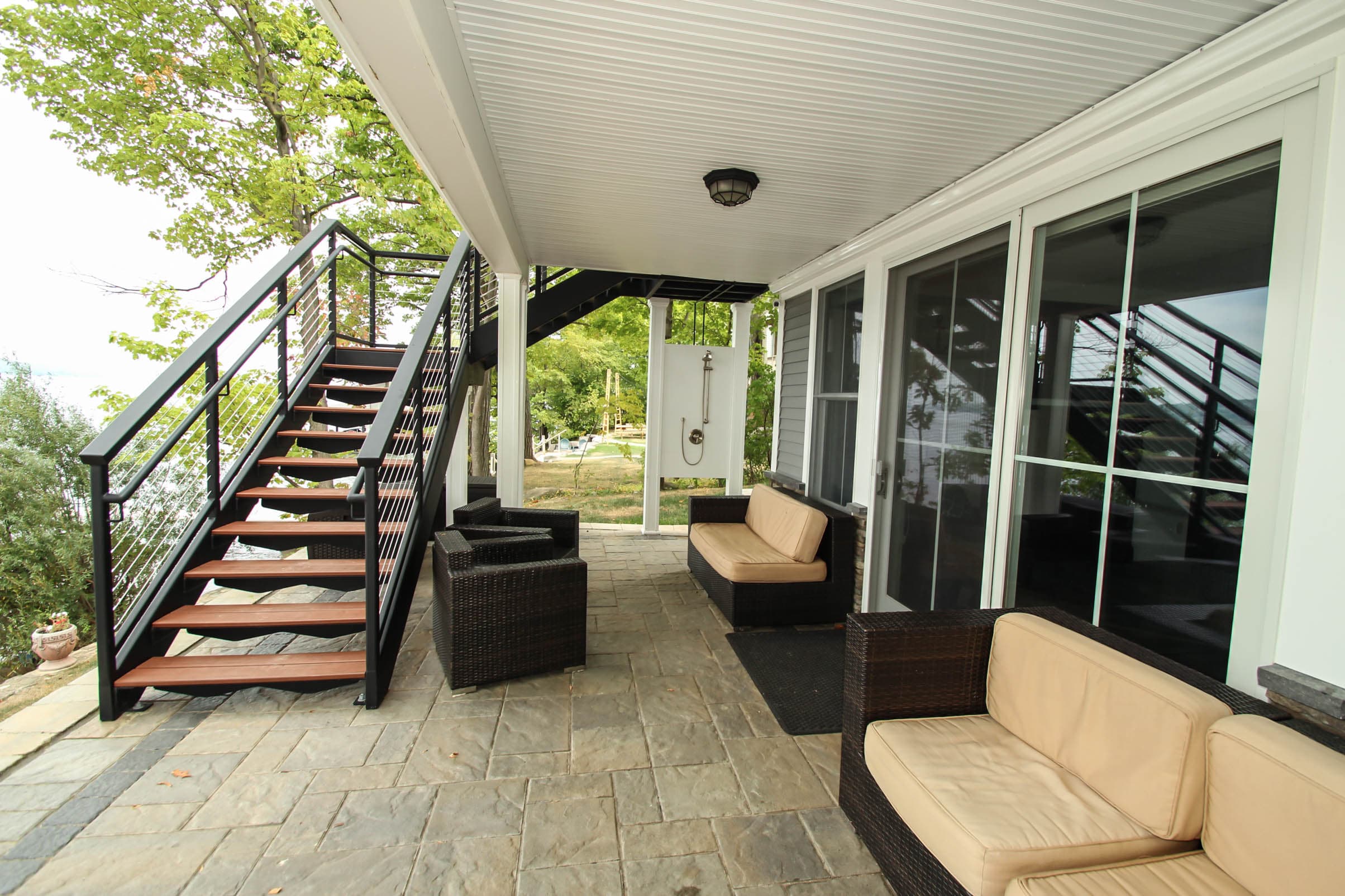 Ground-level patio with lounge seating