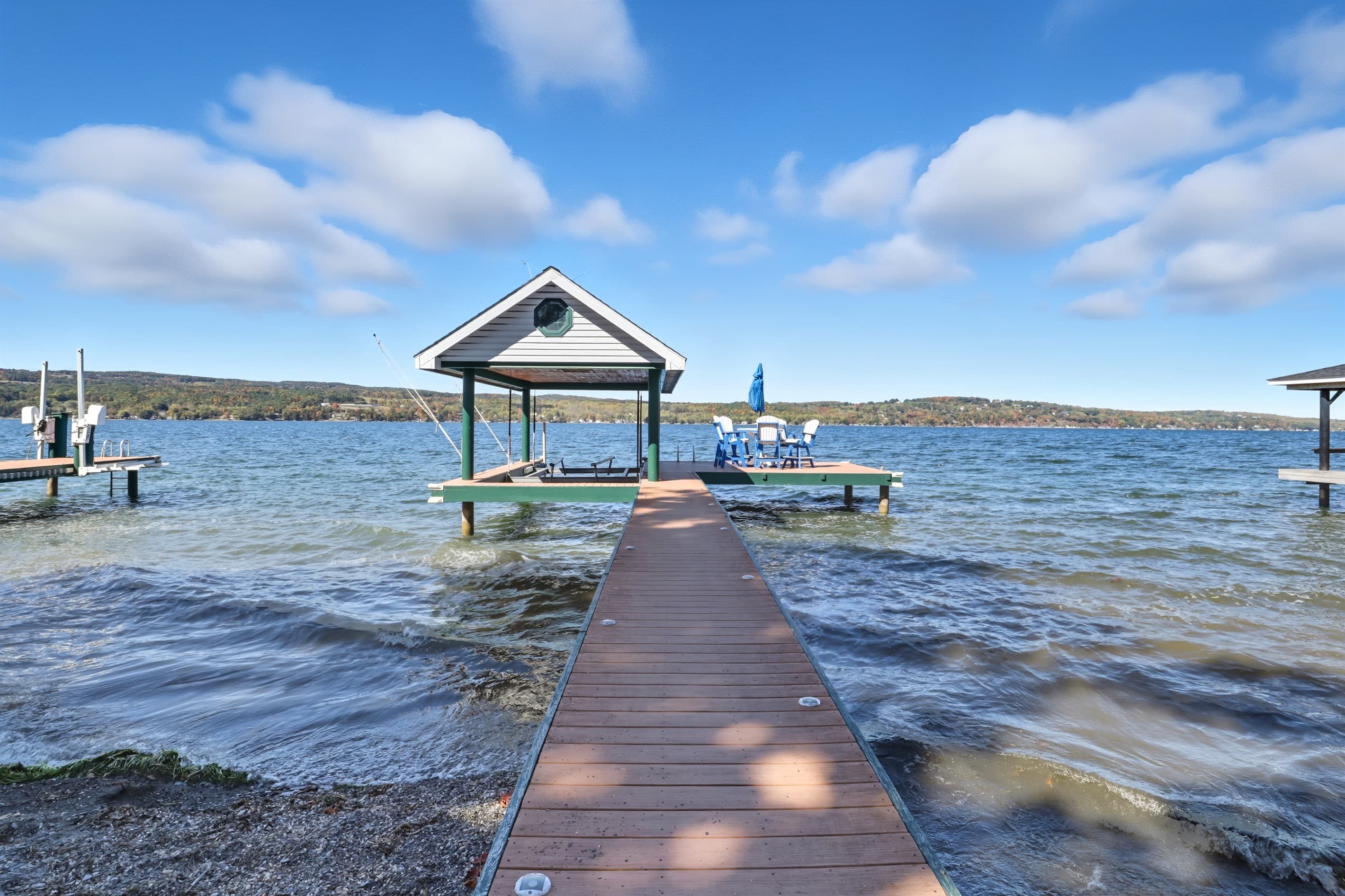 Dock extending toward covered platform