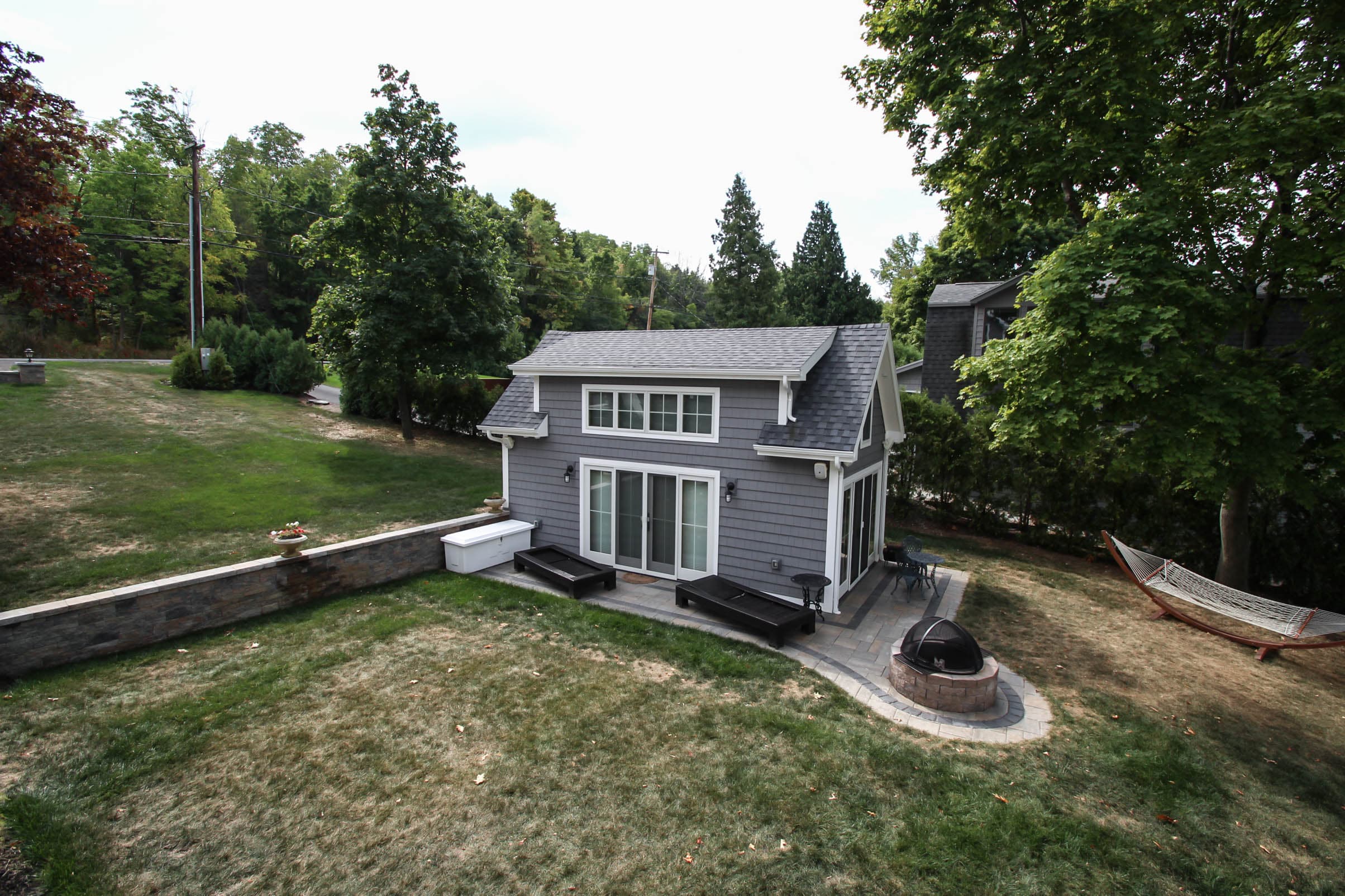 Gray cottage with curved walkway