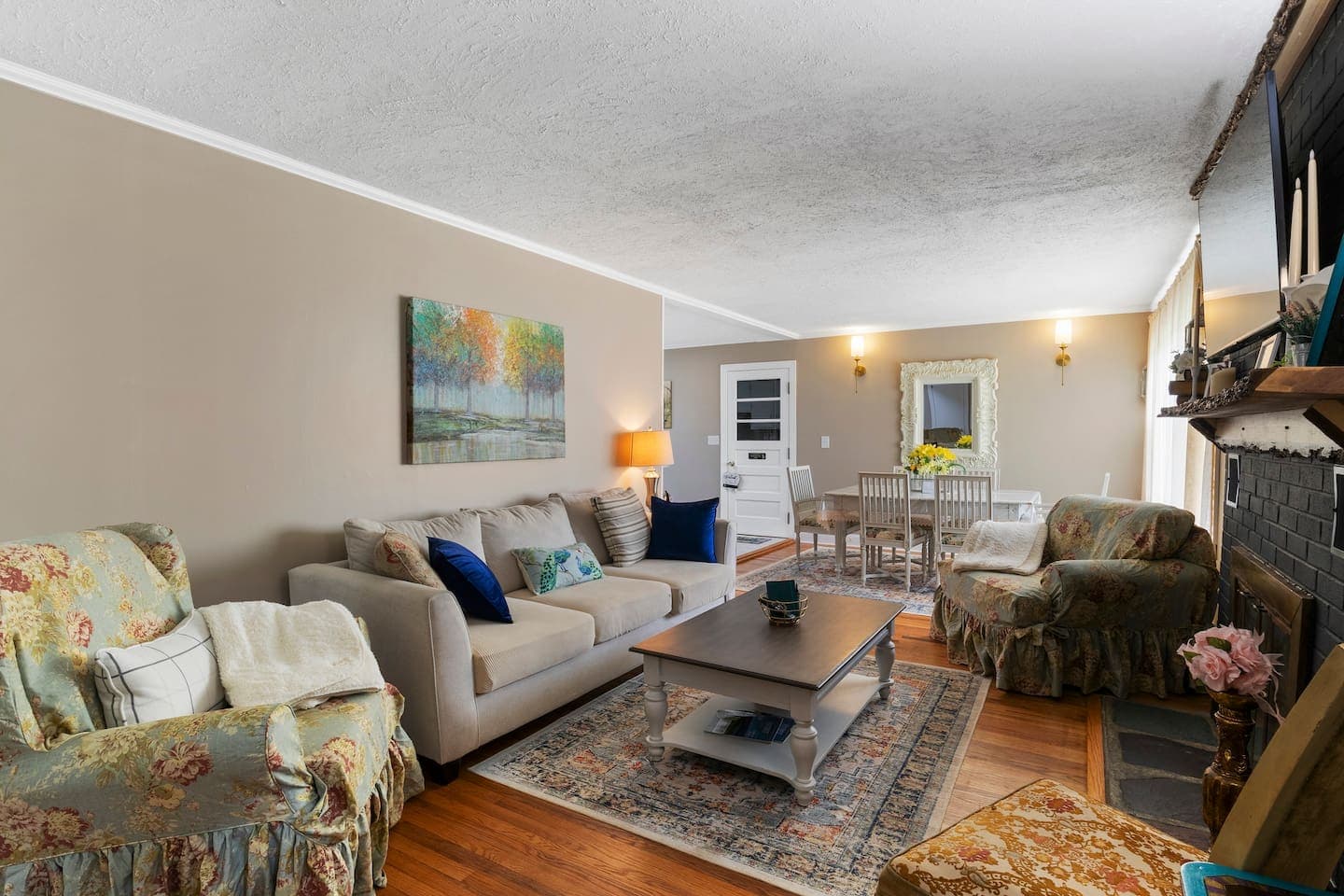 Living room with sectional and fireplace