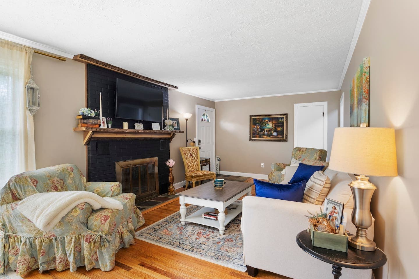 Fireplace with television and surrounding seating