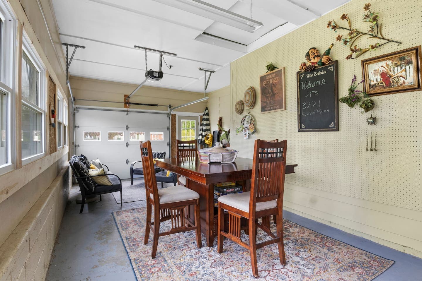 Enclosed porch with wooden dining table