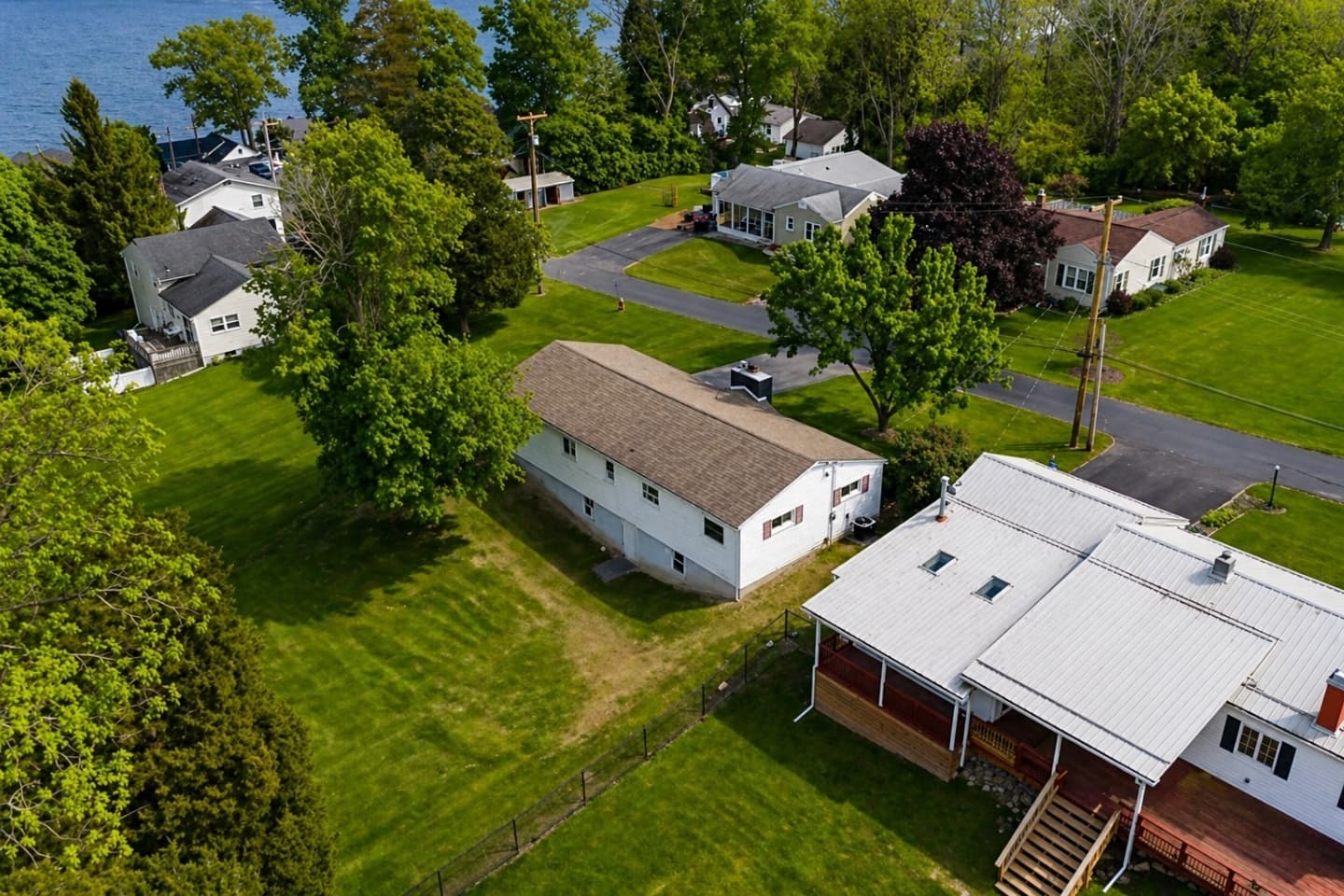 Aerial view of property and outbuildings