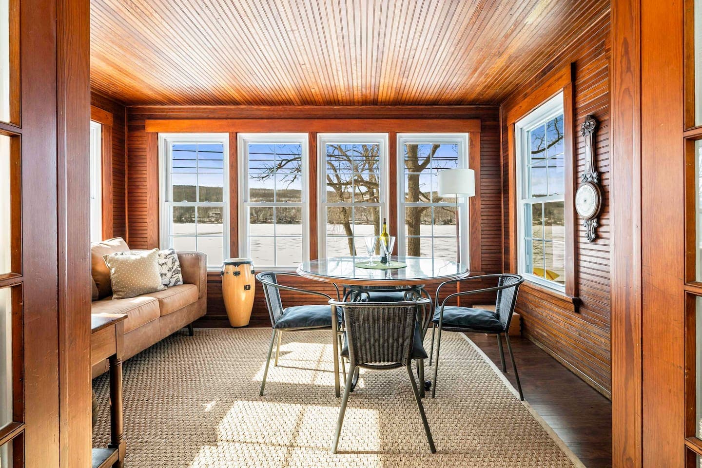 Window-lined sitting area with table
