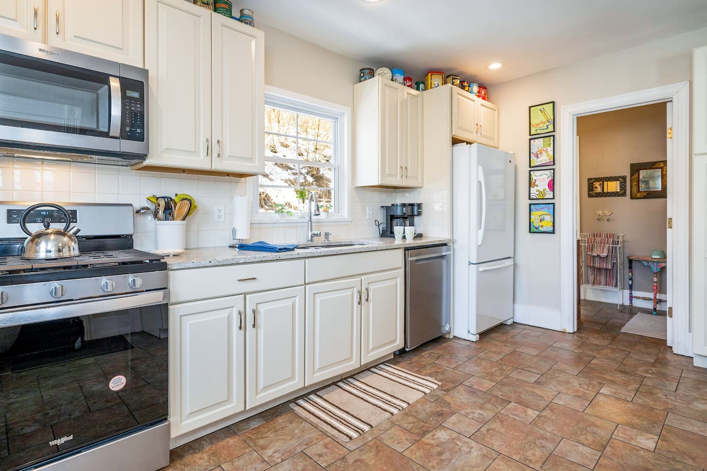 Kitchen sink beneath window overlooking the outdoor