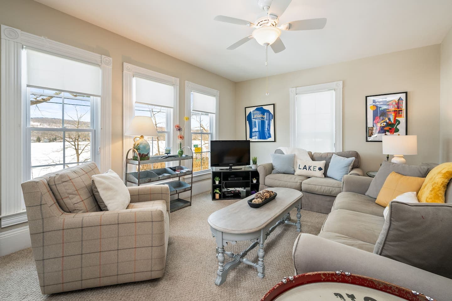 Living room with sectional and armchair