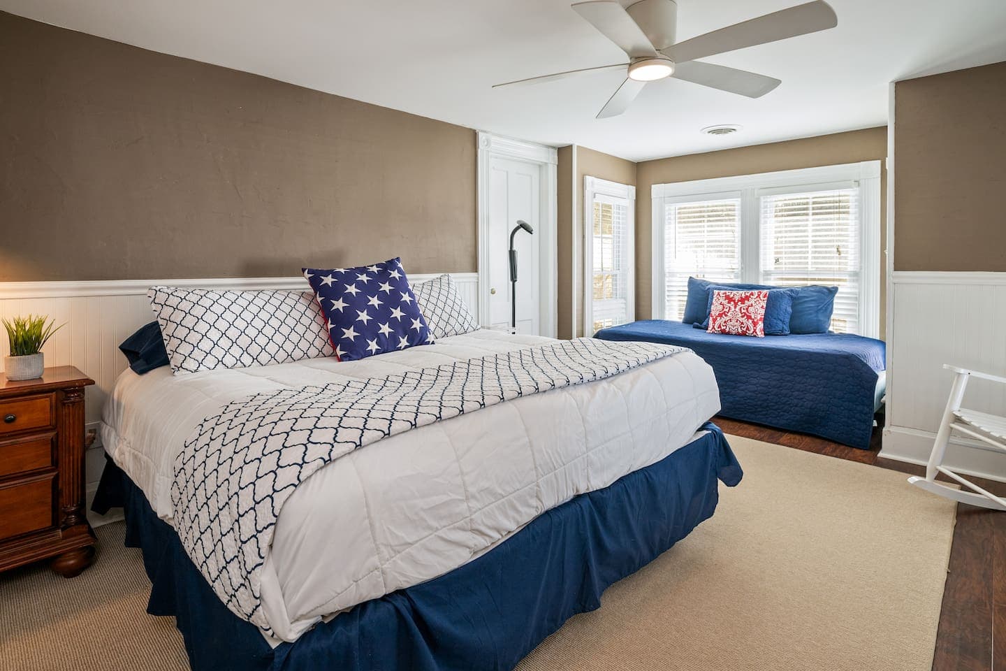 Master bedroom with additional twin bed by the window