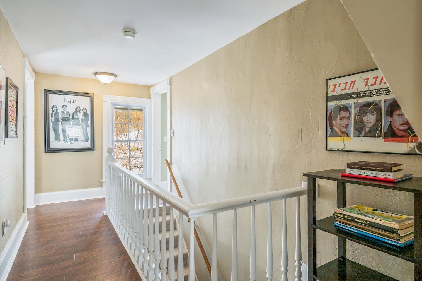 Hallway with wood railings 