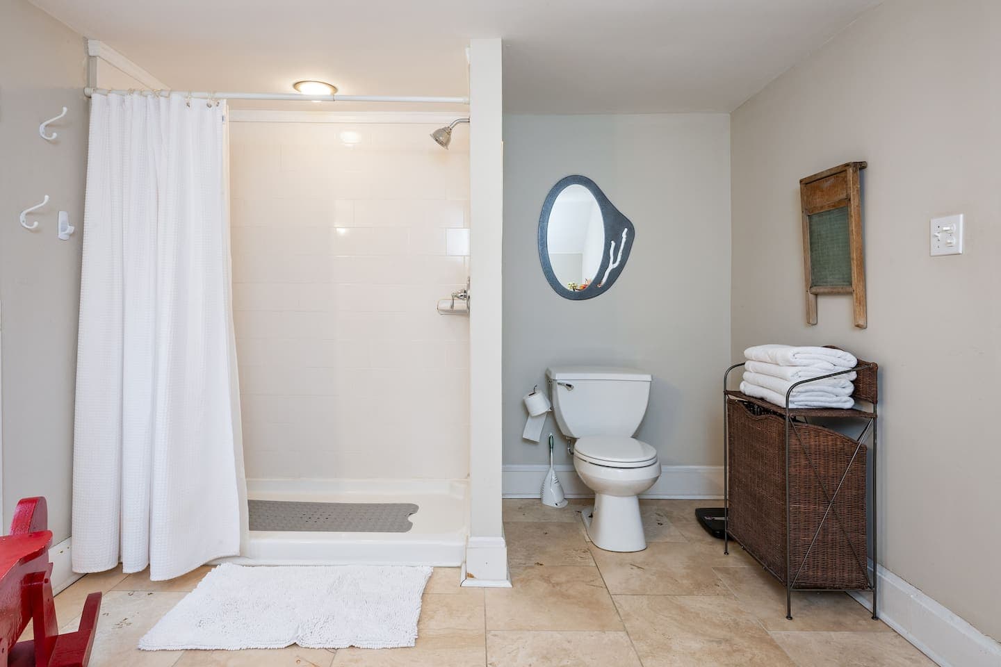 Full bathroom with toilet and walk-in shower 