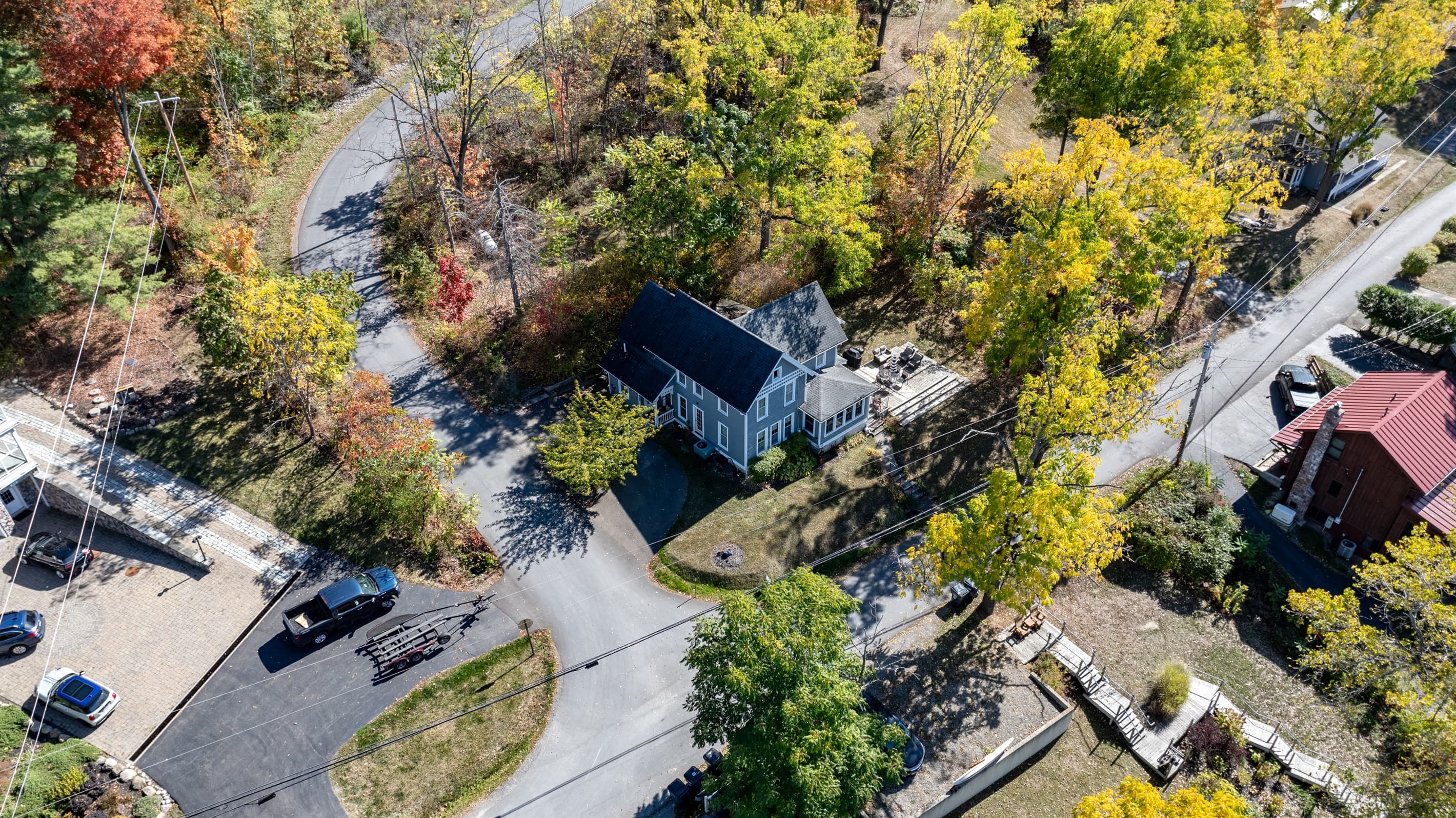 Tree-lined residential road viewed from above